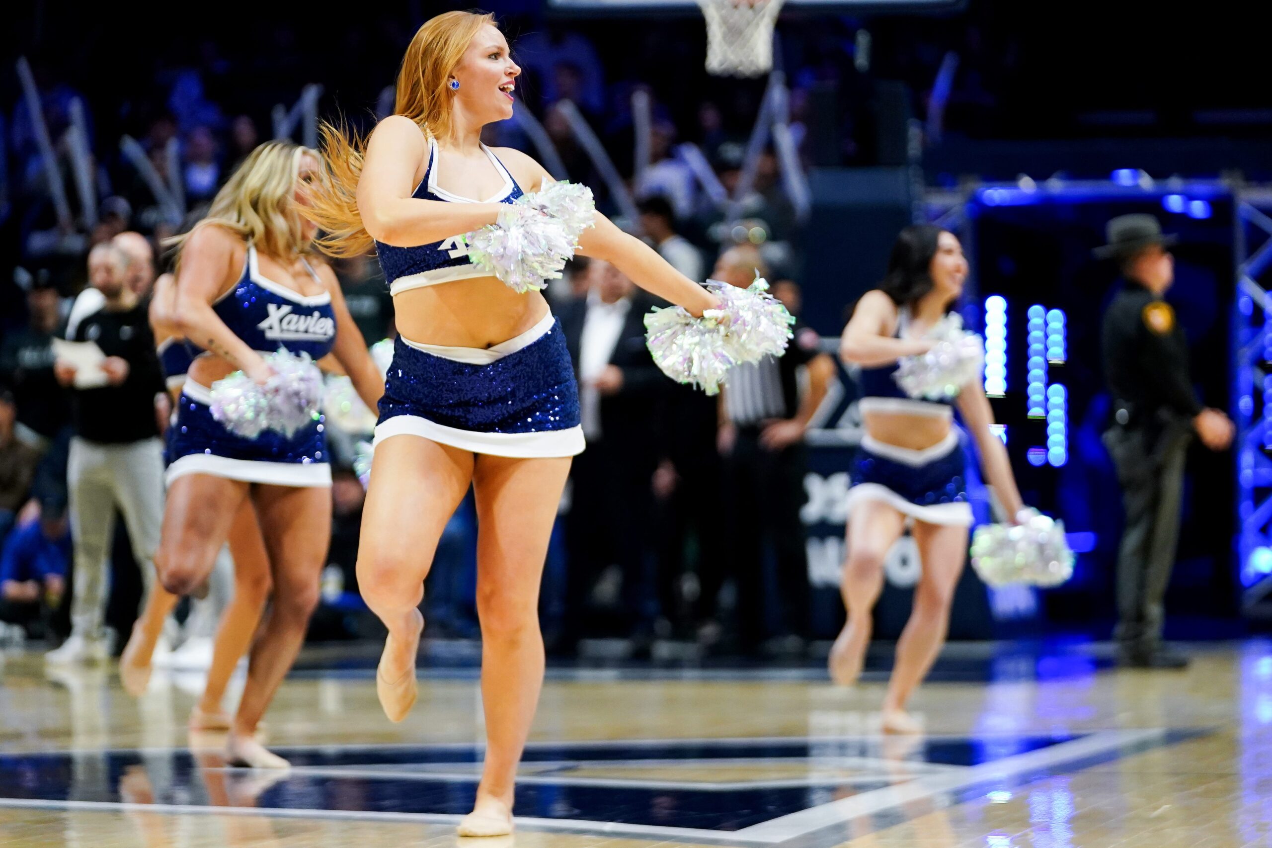 Xavier Musketeers cheerleaders perform a routine in the second half of a NCAA men’s basketball game between the Xavier Musketeers and DePaul Blue Demons, Saturday, Feb. 15, 2025, at Cintas Center in Cincinnati. Musketeers won 85-68.