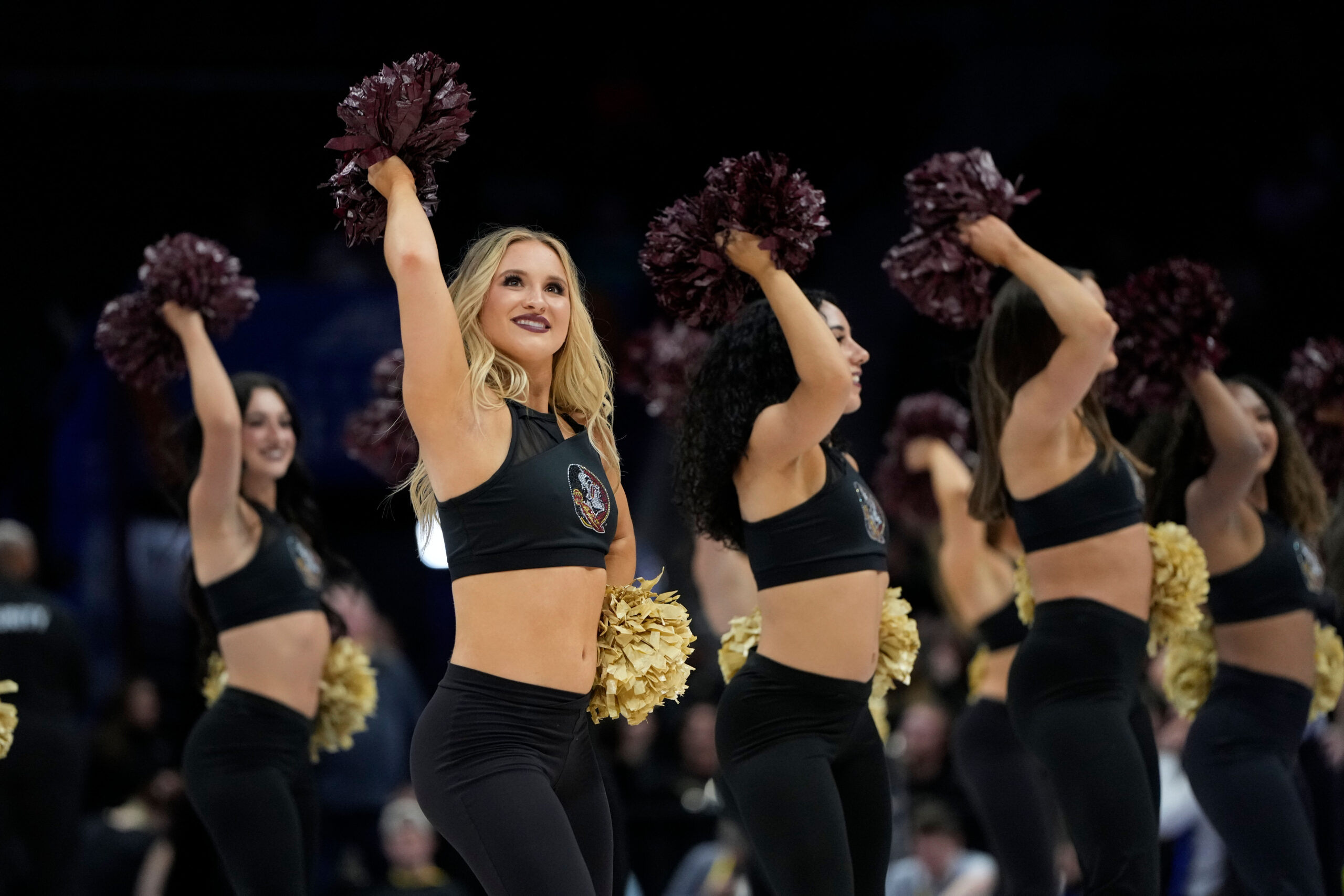 Mar 11, 2025; Charlotte, NC, USA; Florida State Seminoles cheerleaders perform in the first half at Spectrum Center. Mandatory Credit: Bob Donnan-Imagn Images