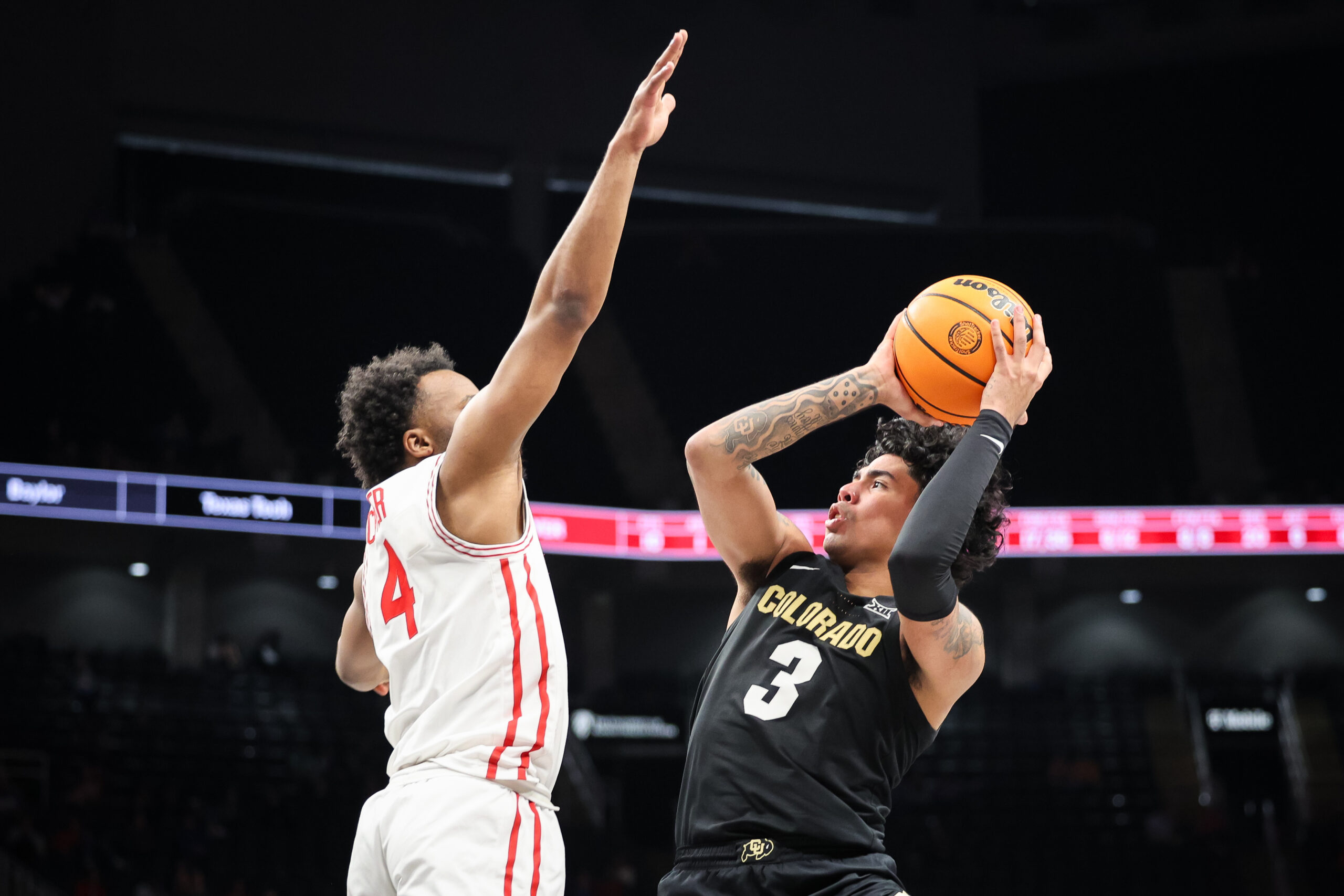 Mar 13, 2025; Kansas City, MO, USA; Colorado Buffaloes guard Julian Hammond III (3) shoots the ball over Houston Cougars guard L.J. Cryer (4) during the second half at T-Mobile Center. Mandatory Credit: William Purnell-Imagn Images