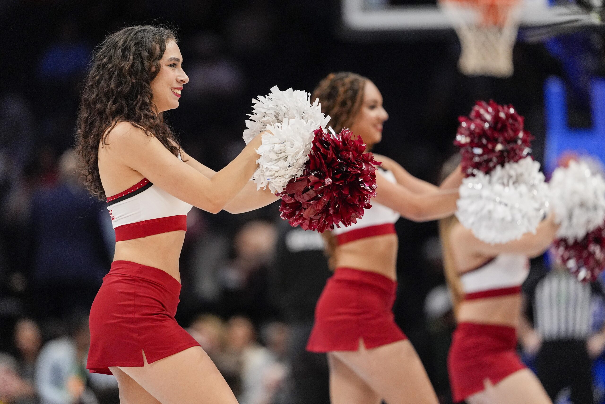 Mar 13, 2025; Charlotte, NC, USA;  Stanford Cardinal cheerleaders perform during the first half against the Louisville Cardinals at Spectrum Center. Mandatory Credit: Jim Dedmon-Imagn Images