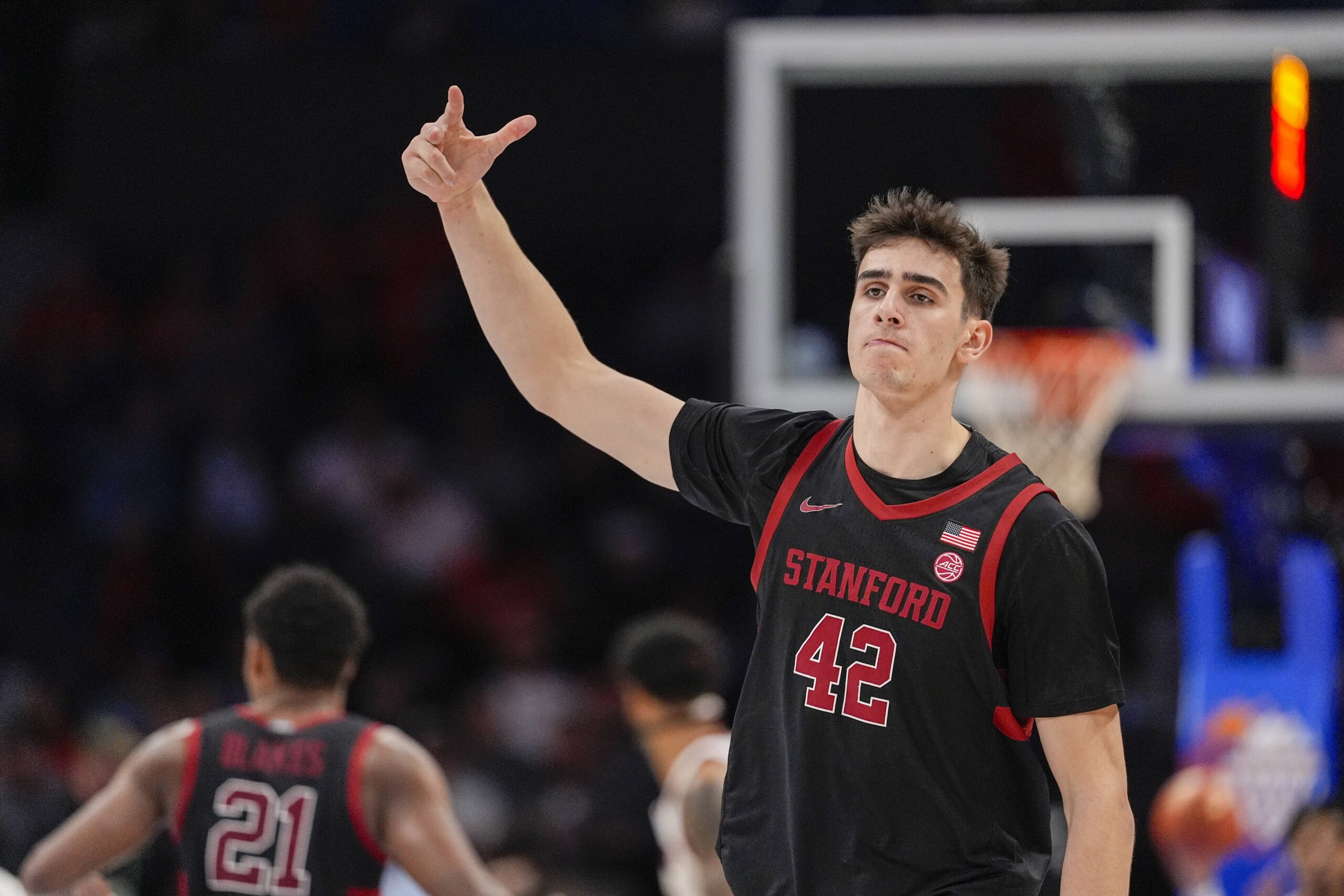 Mar 13, 2025; Charlotte, NC, USA; Stanford Cardinal forward Maxime Raynaud (42) after a dunk against the Louisville Cardinals during the second half at Spectrum Center. Mandatory Credit: Jim Dedmon-Imagn Images