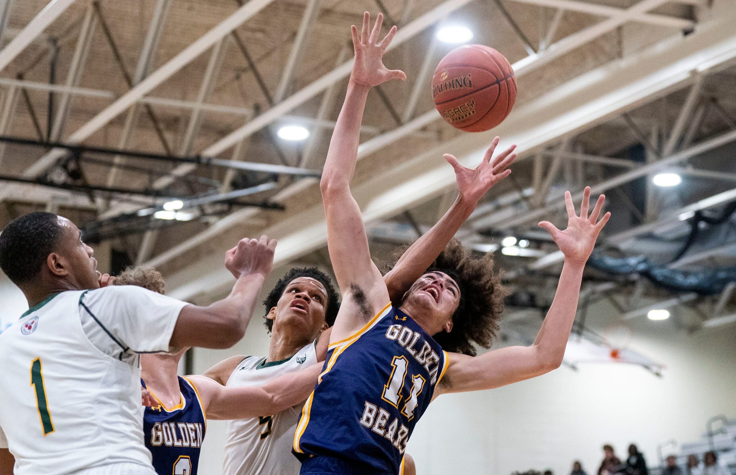 Upper Moreland’s Larry Hughes takes on Bonner-Prendergast’s Aydin Scott for the rebound ball during the PIAA Class 5A boys basketball quarterfinal state playoff game in Norristown on Friday, March 14, 2025.