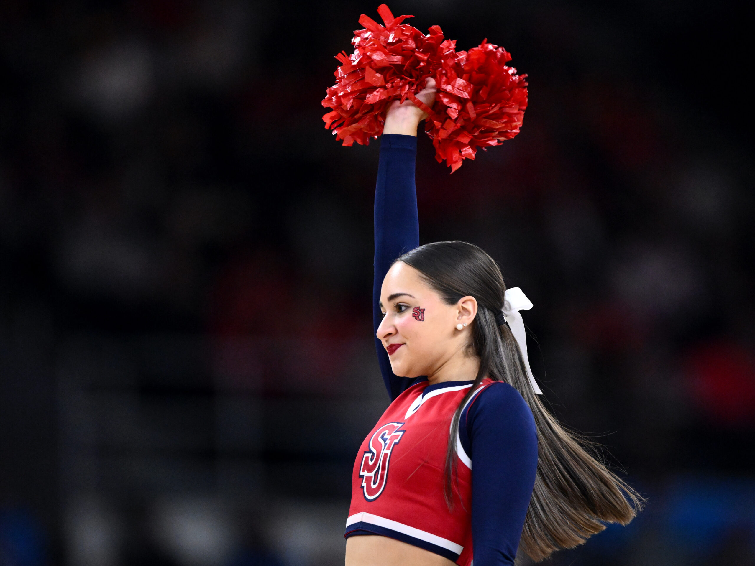 Mar 22, 2025; Providence, RI, USA; St. John's Red Storm cheerleaders perform during a second round men’s NCAA Tournament game against the Arkansas Razorbacks at Amica Mutual Pavilion. Mandatory Credit: Brian Fluharty-Imagn Images