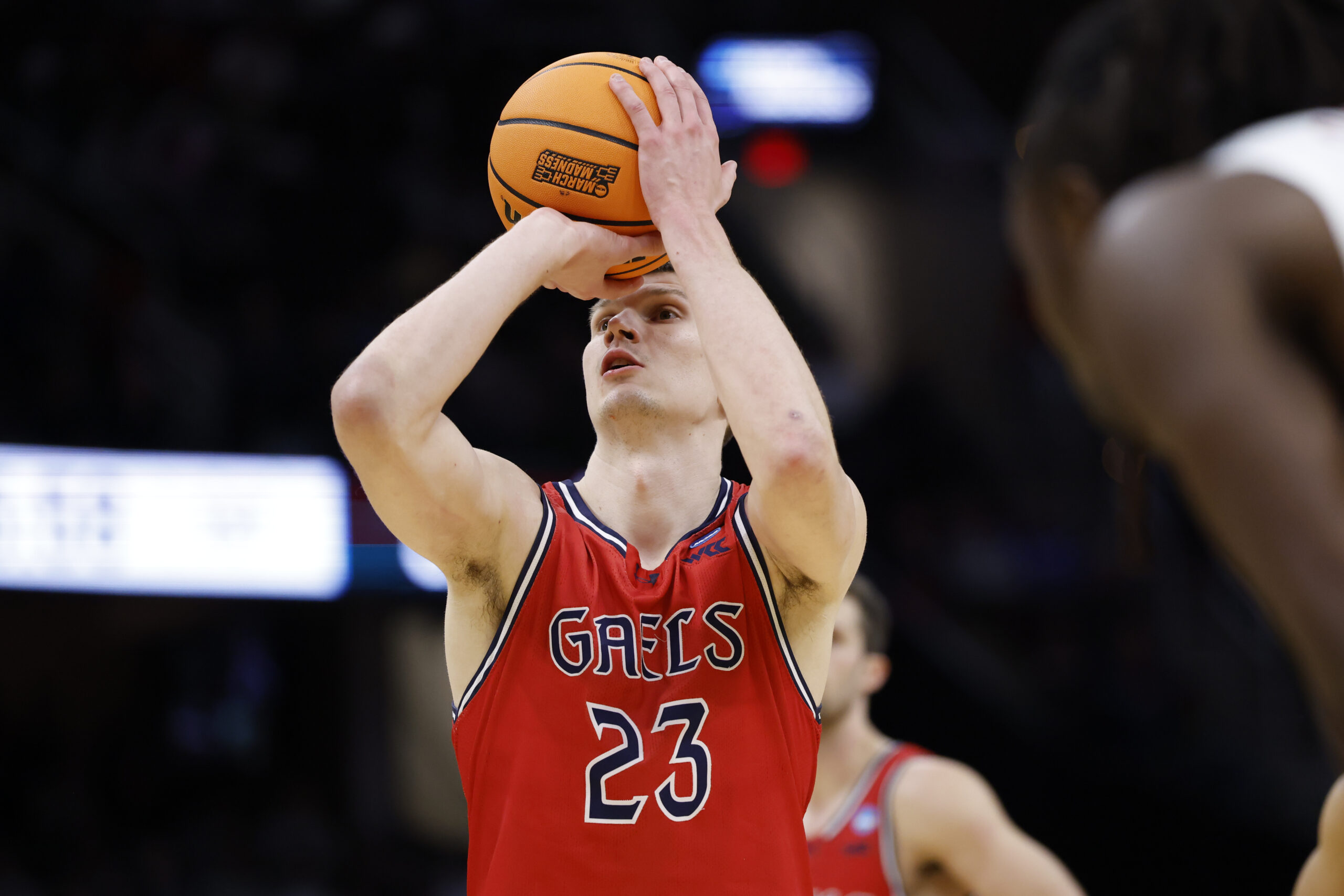 Mar 23, 2025; Cleveland, OH, USA; St. Mary's Gaels forward Paulius Murauskas (23) shoots the ball in the first half against the Alabama Crimson Tide during the NCAA Tournament Second Round at Rocket Arena. Mandatory Credit: Rick Osentoski-Imagn Images