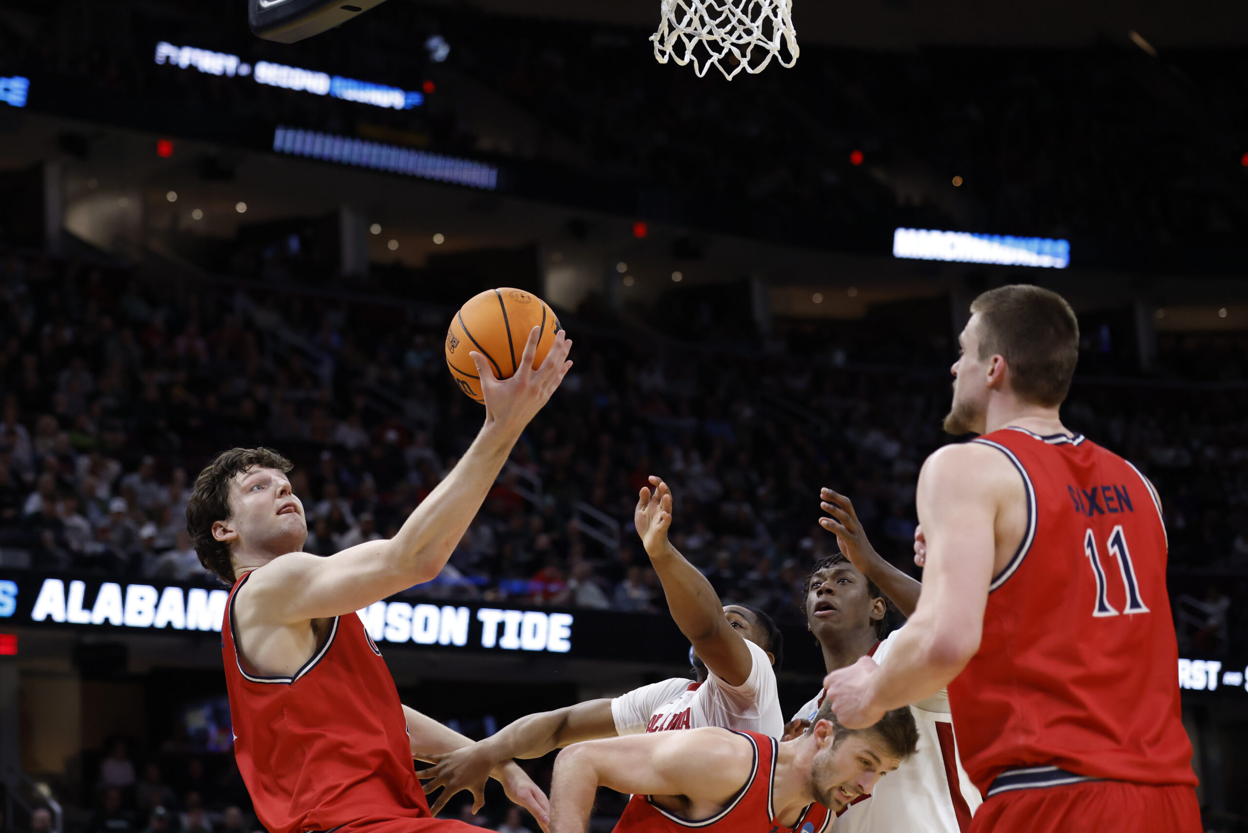 Mar 23, 2025; Cleveland, OH, USA; St. Mary's Gaels center Harry Wessels (1) collects the ball in the second half against the Alabama Crimson Tide during the NCAA Tournament Second Round at Rocket Arena. Mandatory Credit: Rick Osentoski-Imagn Images