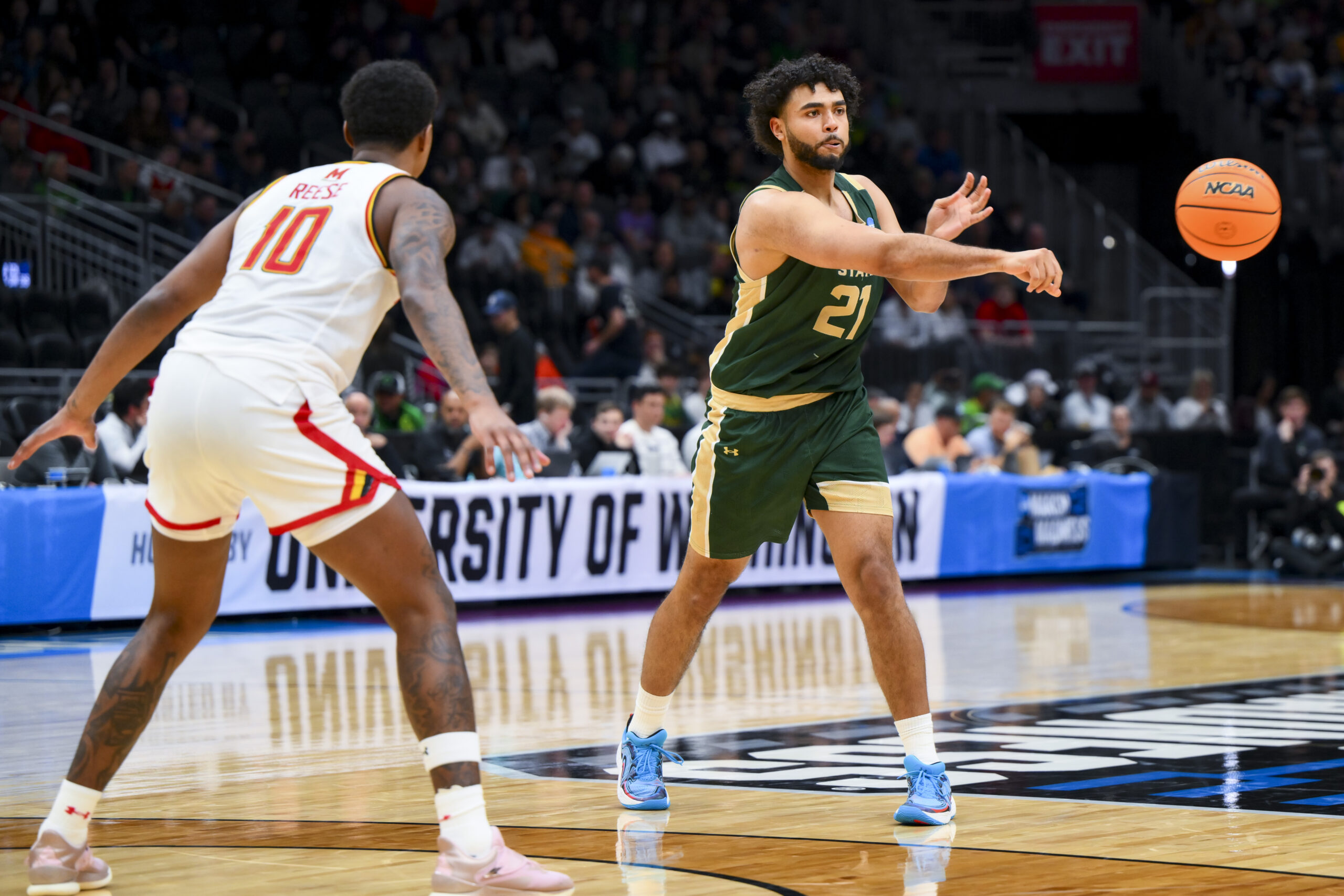 Mar 23, 2025; Seattle, WA, USA; Colorado State Rams forward Rashaan Mbemba (21) passes the ball against the Maryland Terrapins in the first half at Climate Pledge Arena. Mandatory Credit: Steven Bisig-Imagn Images