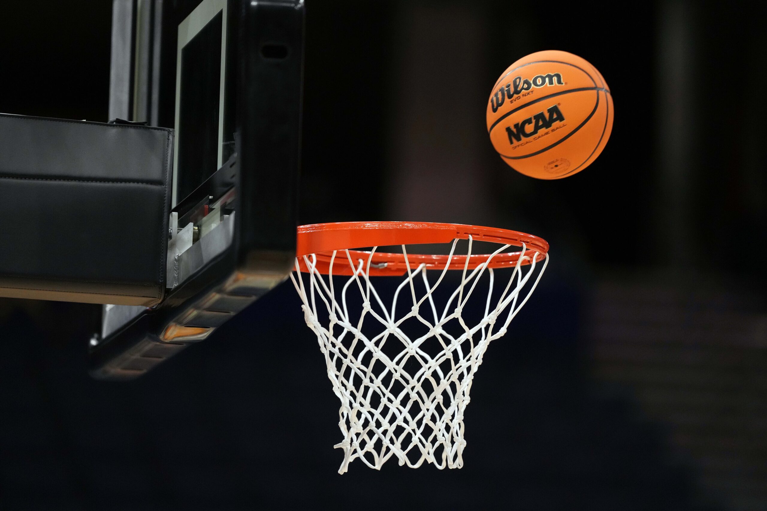Apr 3, 2025; Tampa, FL, USA; A Wilson EVO Nxt basketball ball with the 2025 NCAA Women's Final Four logo approaches the rim and the net at Amalie Arena. Mandatory Credit: Kirby Lee-Imagn Images