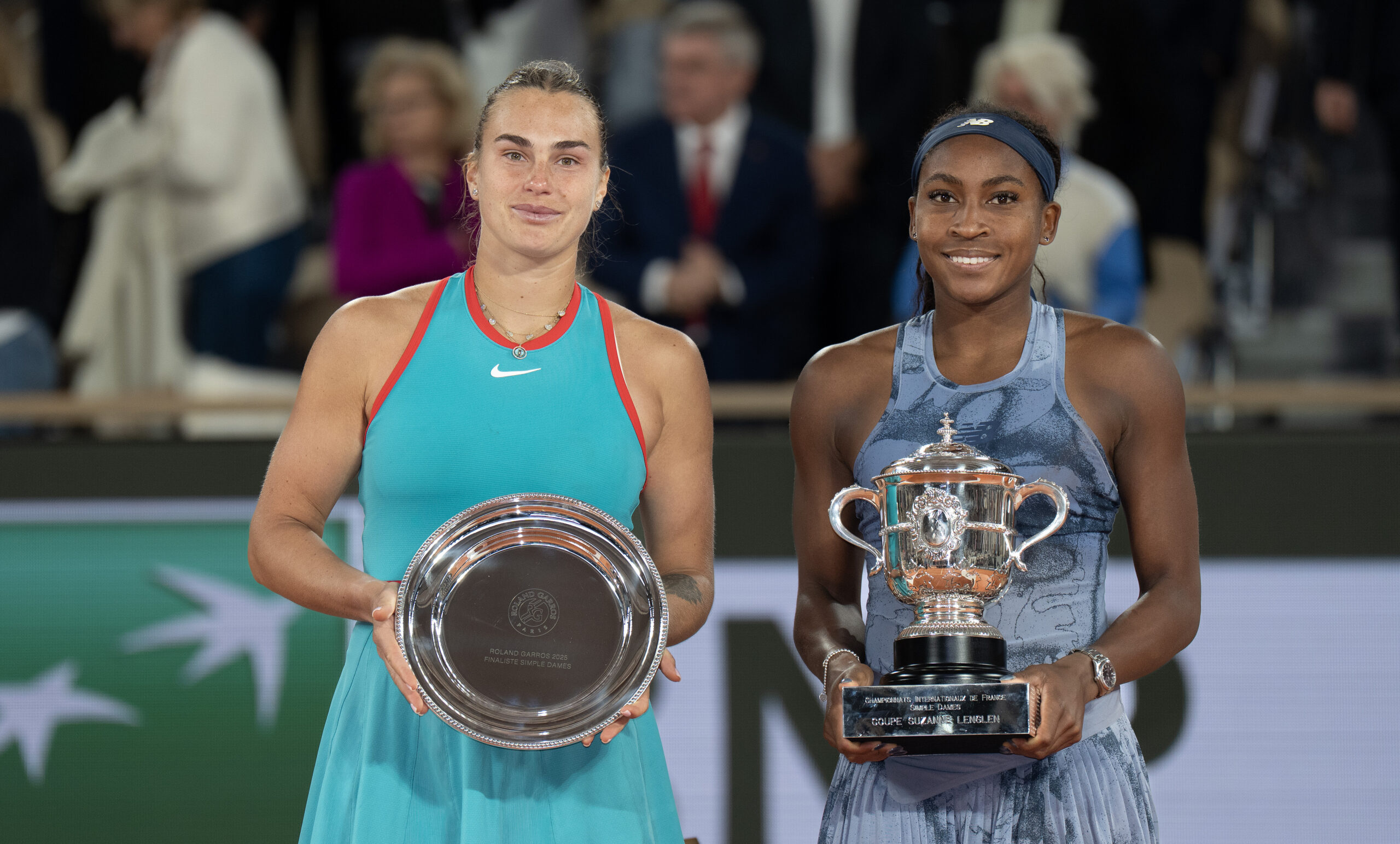 Jun 7, 2025; Paris, FR; Coco Gauff of the United States poses with Aryna Sabalenka after their match on day 14 at Roland Garros Stadium. Mandatory Credit: Susan Mullane-Imagn Images