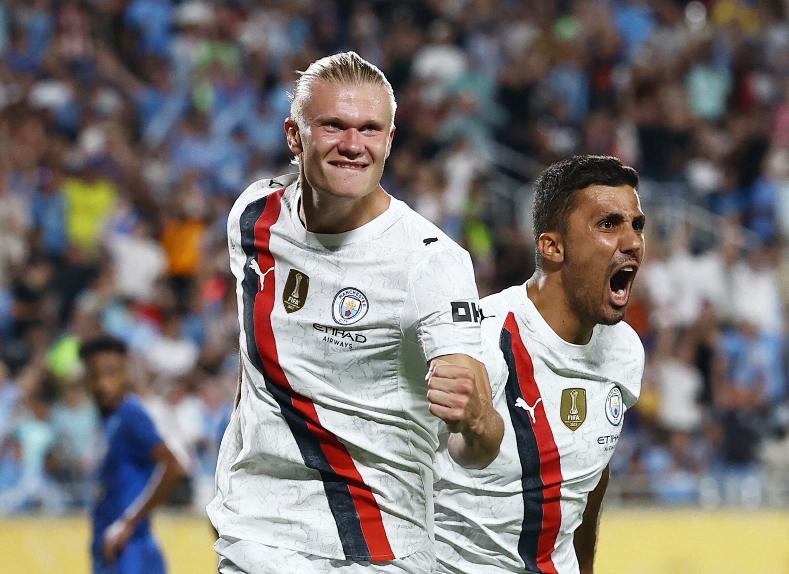 [Subscription Customers Only] Jun 30, 2025; Orlando, Florida, USA; Manchester City forward Erling Haaland (9) celebrates scoring their second goal with midfielder Rodri (16) during a round of 16 match of the 2025 FIFA Club World Cup at Camping World Stadium. Mandatory Credit: Lee Smith-Reuters via Imagn Images