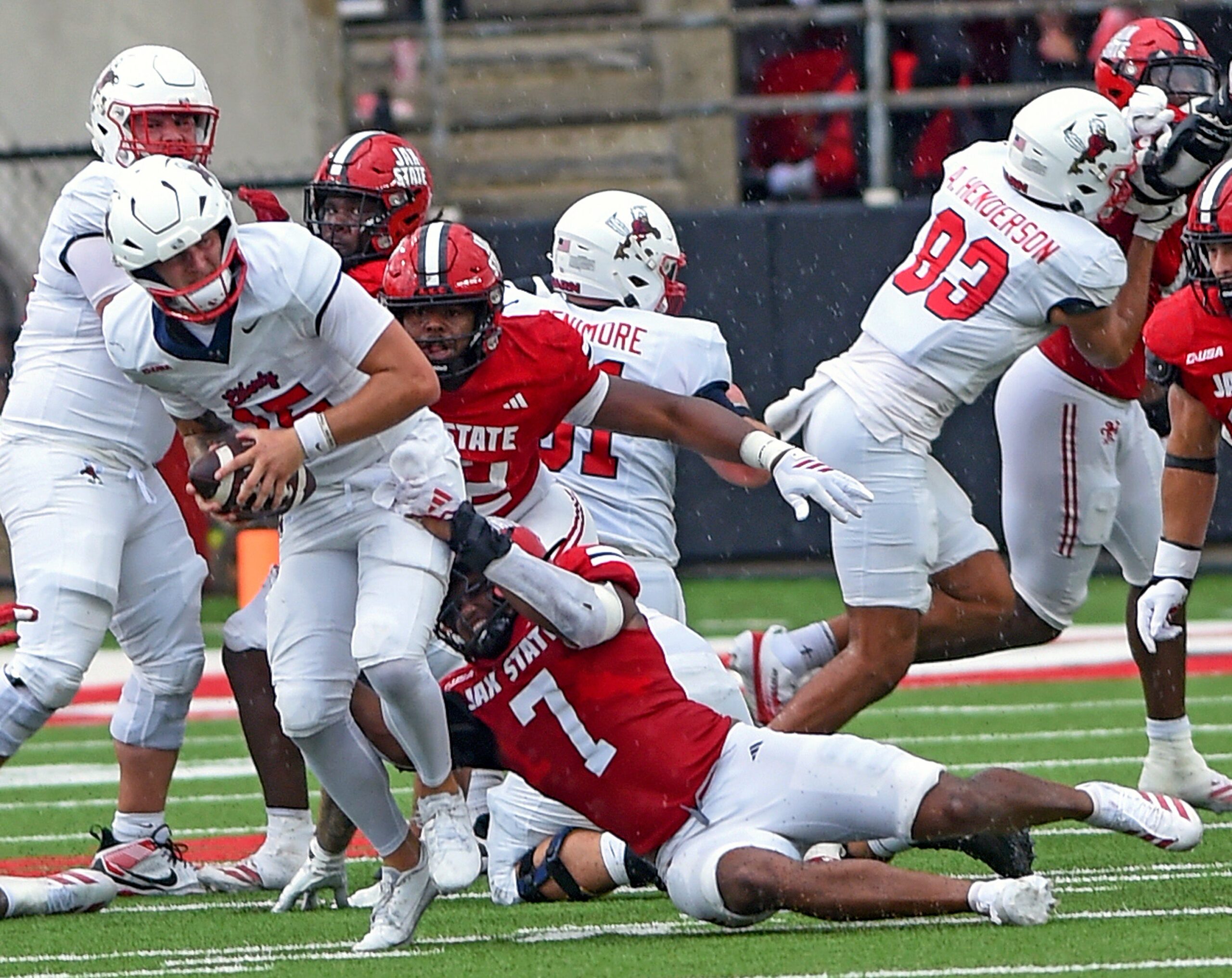 Jacksonville StateÕs Isaac Walker sacks Liberty quarterback Ethan Vasko during college school football action at AmFirst Stadium in Jacksonville, Alabama September 6, 2025. (Dave Hyatt / Hyatt Media LLC)