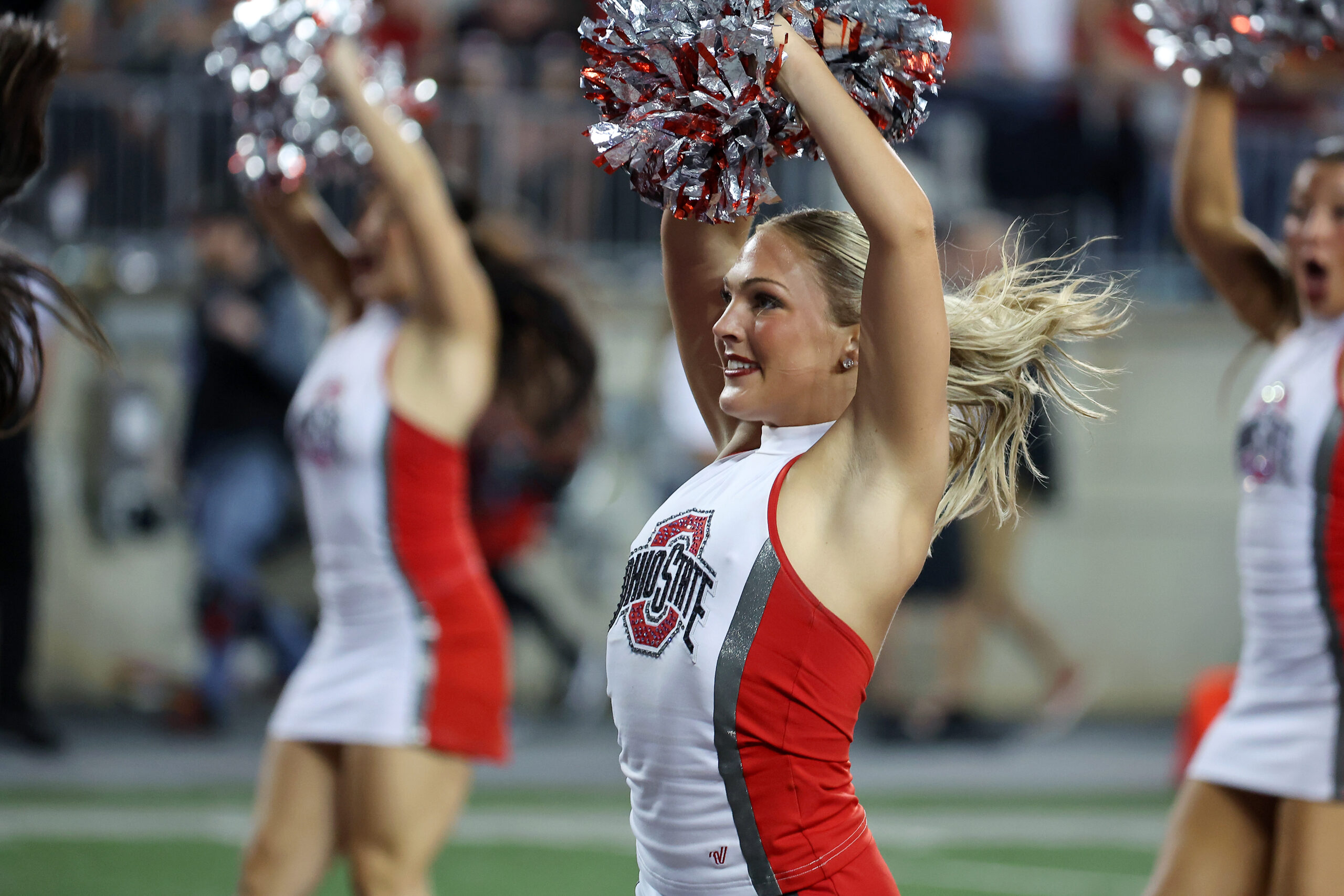 Sep 13, 2025; Columbus, Ohio, USA; Ohio State Buckeyes cheerleader cheer during the second half against the Ohio Bobcats at Ohio Stadium. Mandatory Credit: Joseph Maiorana-Imagn Images