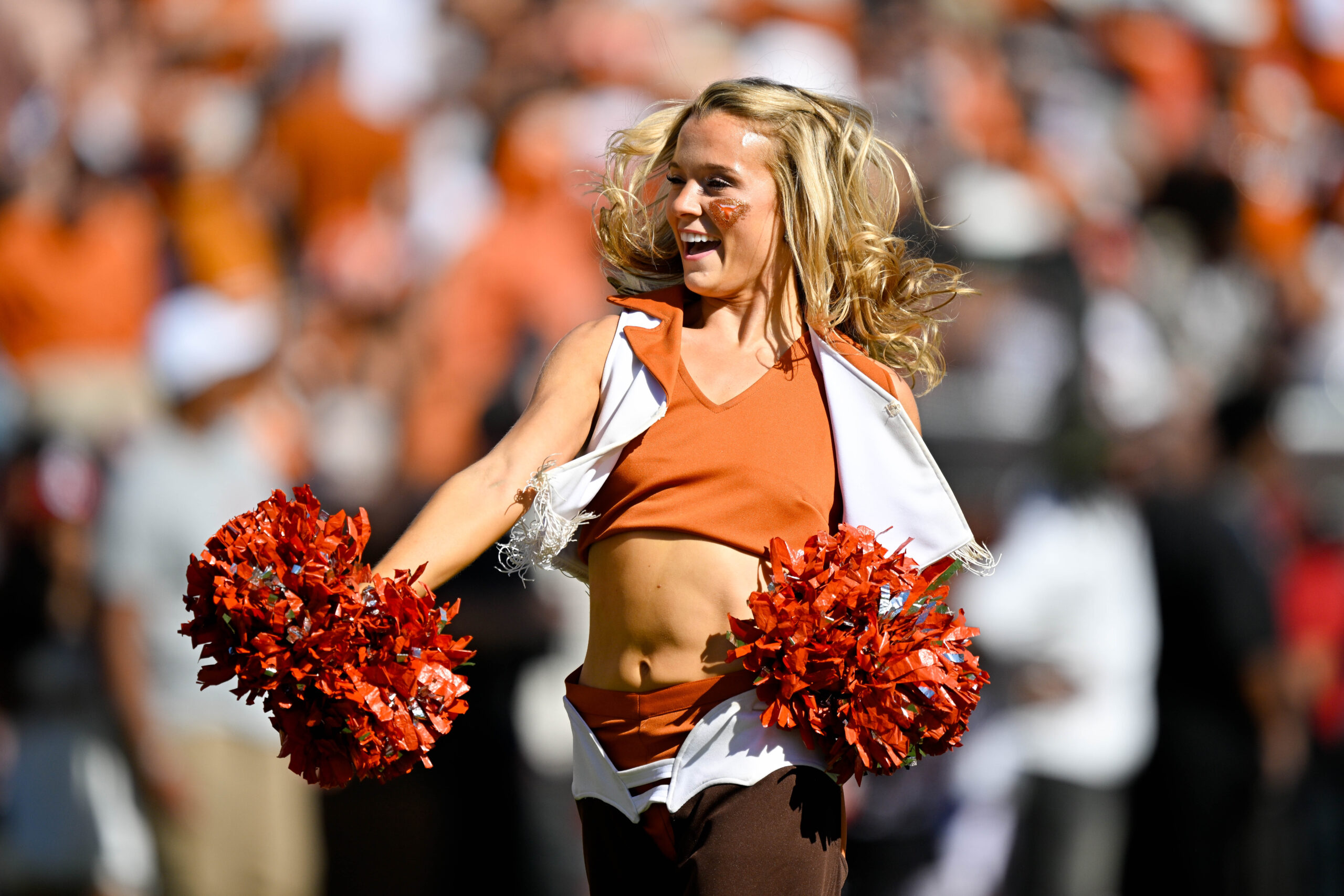 Oct 11, 2025; Dallas, Texas, USA; The Texas Longhorns cheerleaders perform during the first half against the Oklahoma Sooners at the Cotton Bowl. Mandatory Credit: Jerome Miron-Imagn Images