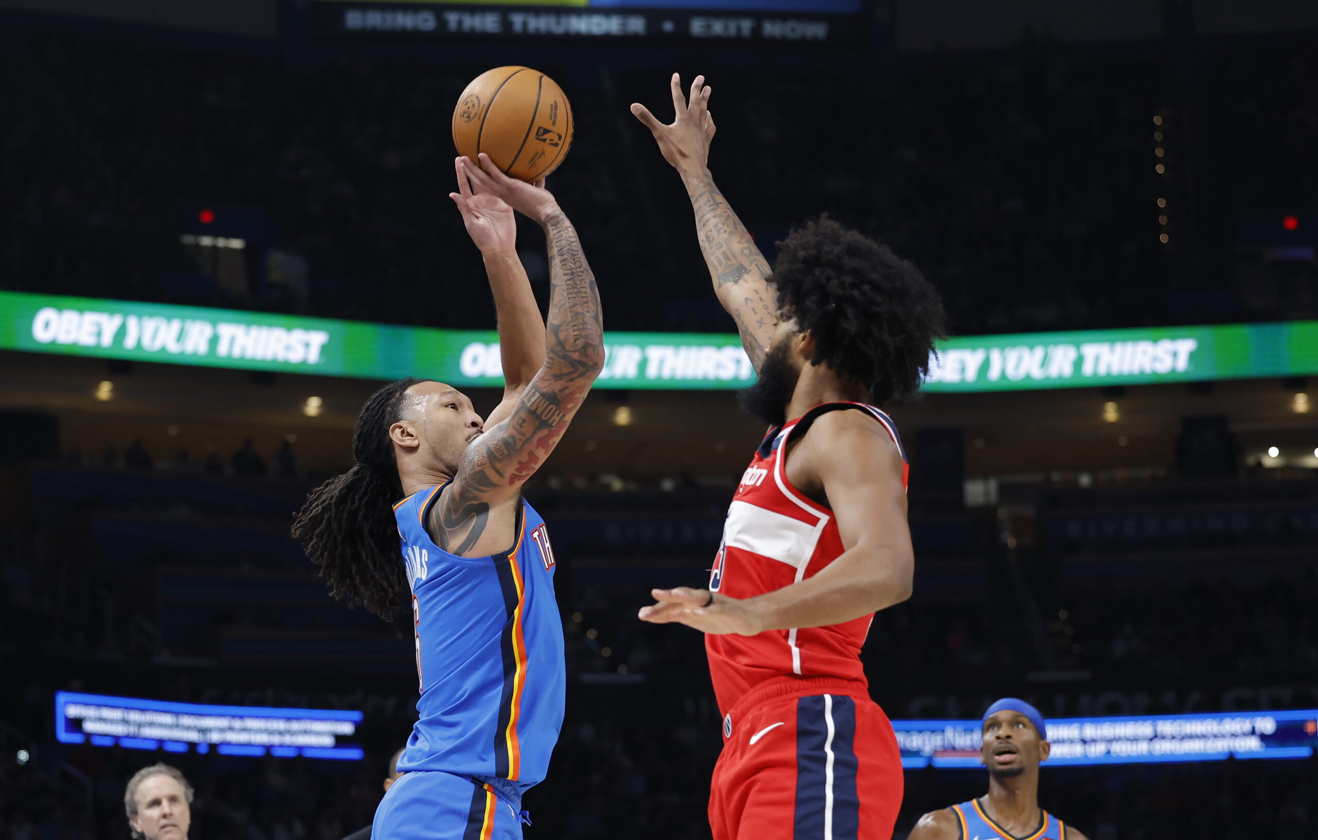 Oct 30, 2025; Oklahoma City, Oklahoma, USA; Oklahoma City Thunder forward Jaylin Williams (6) shoots over Washington Wizards forward Marvin Bagley III (35) during the second half at Paycom Center. Mandatory Credit: Alonzo Adams-Imagn Images