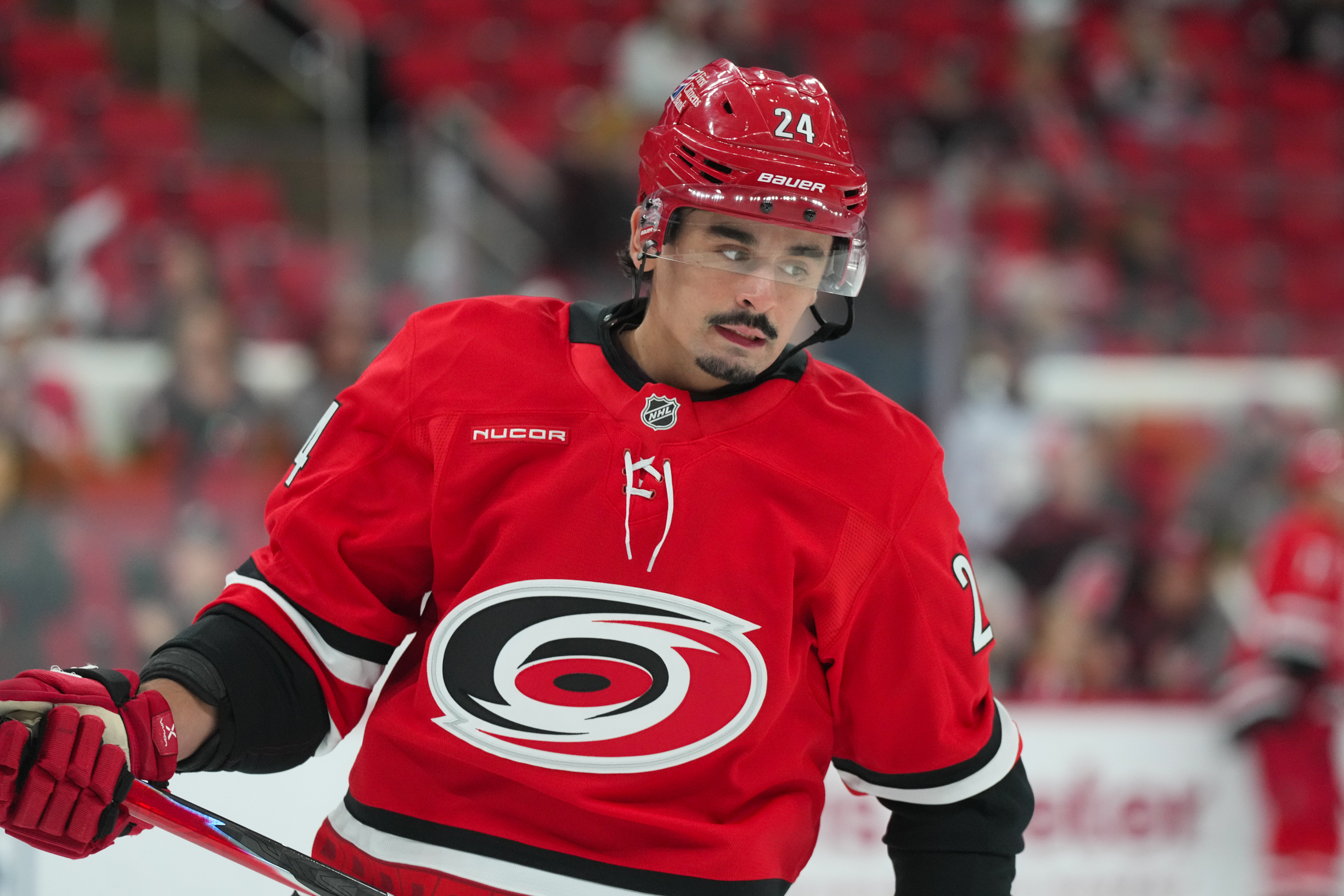 Oct 30, 2025; Raleigh, North Carolina, USA; Carolina Hurricanes center Seth Jarvis (24) skates during the warmups before the game against the New York Islanders at Lenovo Center. Mandatory Credit: James Guillory-Imagn Images