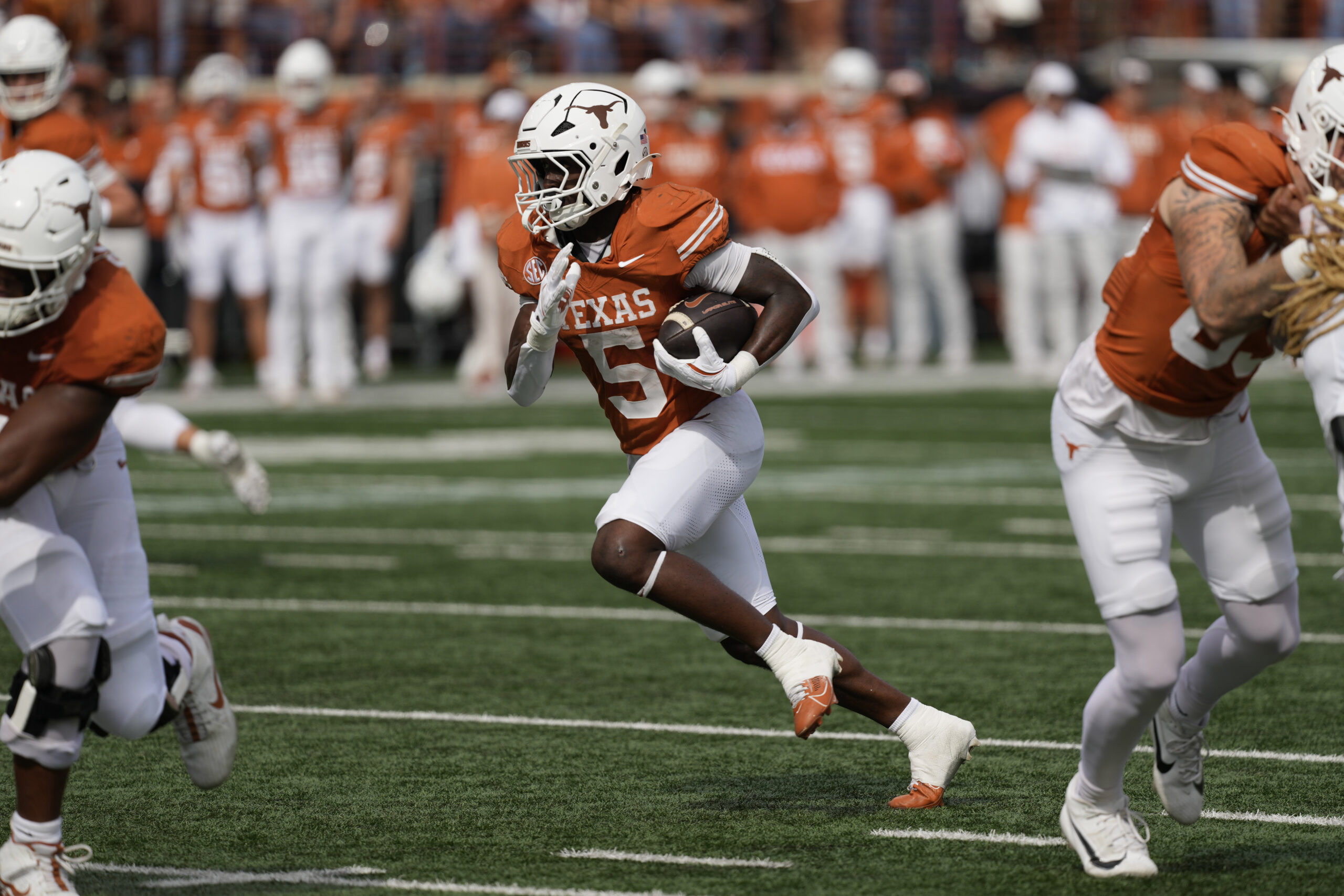 Nov 1, 2025; Austin, Texas, USA; Texas Longhorns running back Quintrevion Wisner (5) runs for a touchdown in the first half against the Vanderbilt Commodores at Darrell K Royal-Texas Memorial Stadium. Mandatory Credit: Scott Wachter-Imagn Images