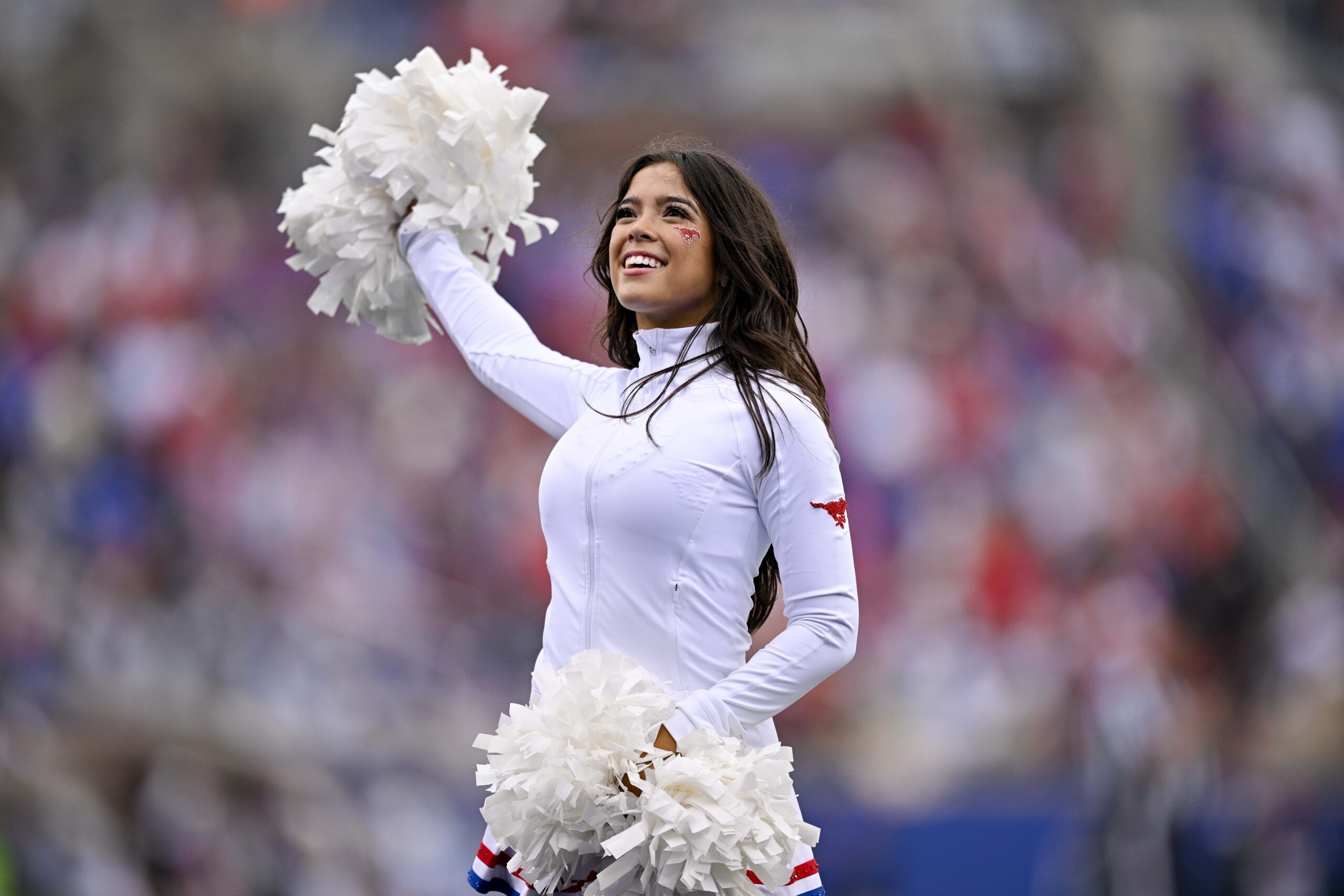 Nov 1, 2025; Dallas, Texas, USA; The SMU Mustangs cheerleaders perform during the game against the Miami Hurricanes at Gerald J. Ford Stadium. Mandatory Credit: Jerome Miron-Imagn Images