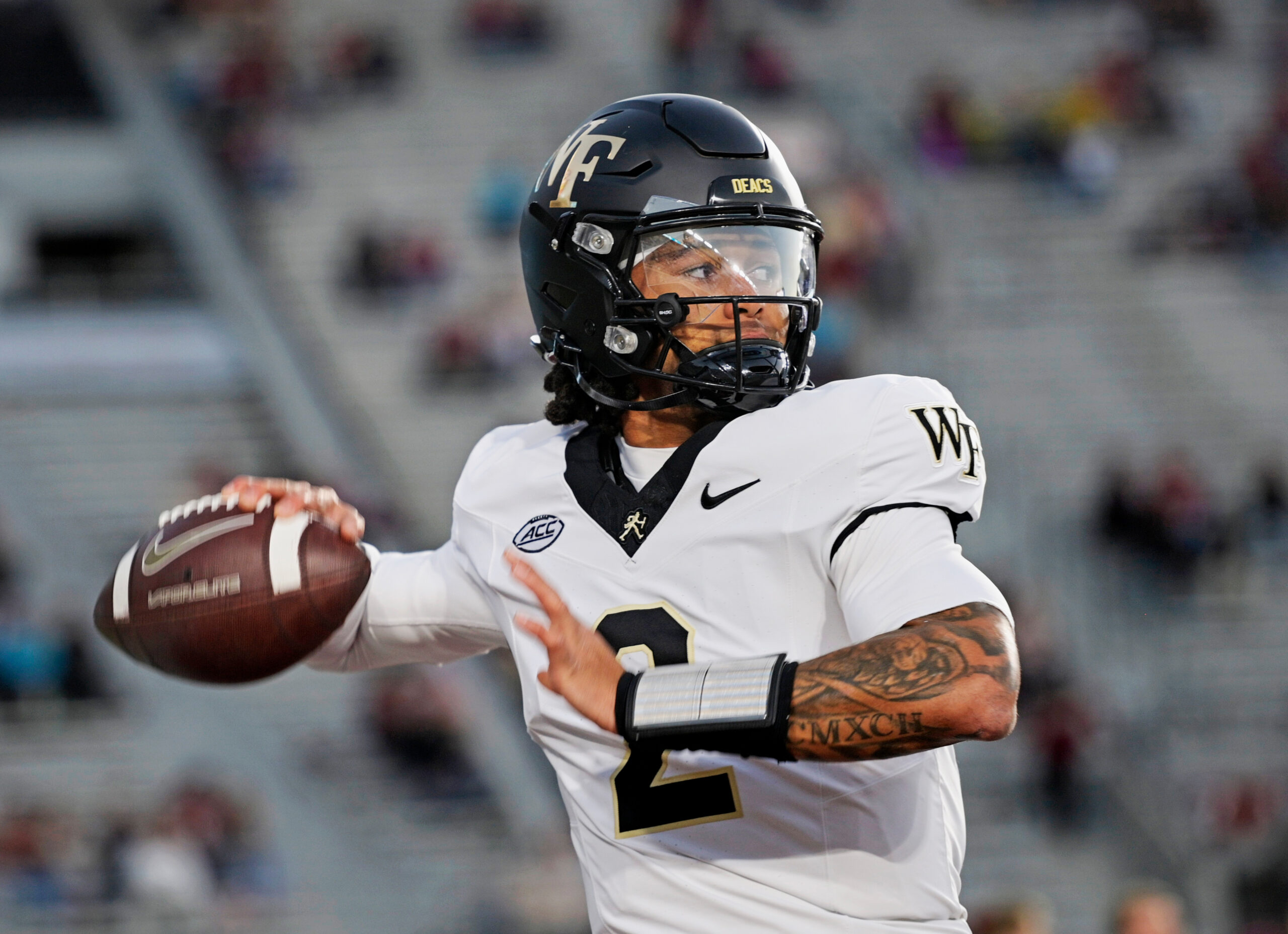 Nov 1, 2025; Tallahassee, Florida, USA; Wake Forest Demon Deacons quarterback Robby Ashford (2) throws a pass during warmups before the game against the Florida State Seminoles at Doak S. Campbell Stadium. Mandatory Credit: Melina Myers-Imagn Images