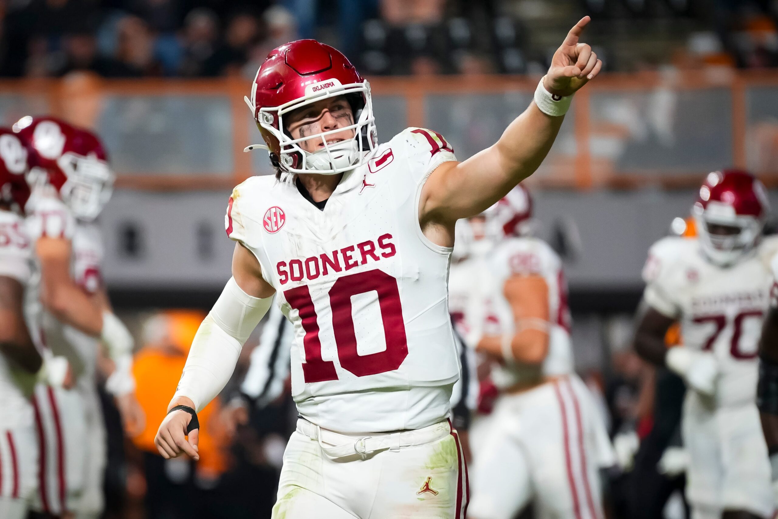 Oklahoma quarterback John Mateer (10) points toward the Oklahoma section after a fourth quarter touchdown during a college football game between Tennessee and Oklahoma in Neyland Stadium in Knoxville on Nov. 1, 2025.