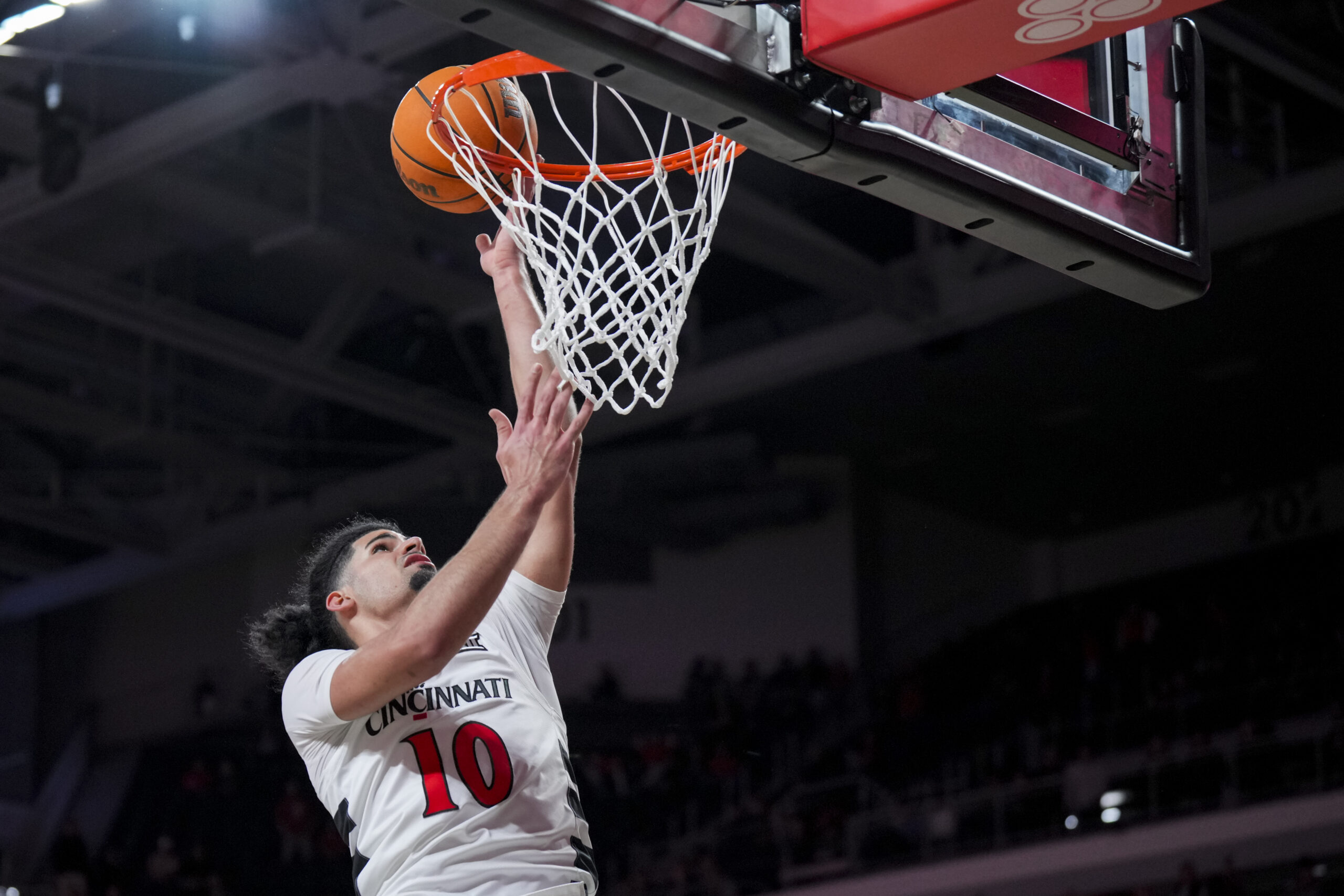 Nov 3, 2025; Cincinnati, Ohio, USA; Cincinnati Bearcats guard Shon Abaev (10) drives to the basket against the Western Carolina Catamounts in the second half at Fifth Third Arena. Mandatory Credit: Aaron Doster-Imagn Images