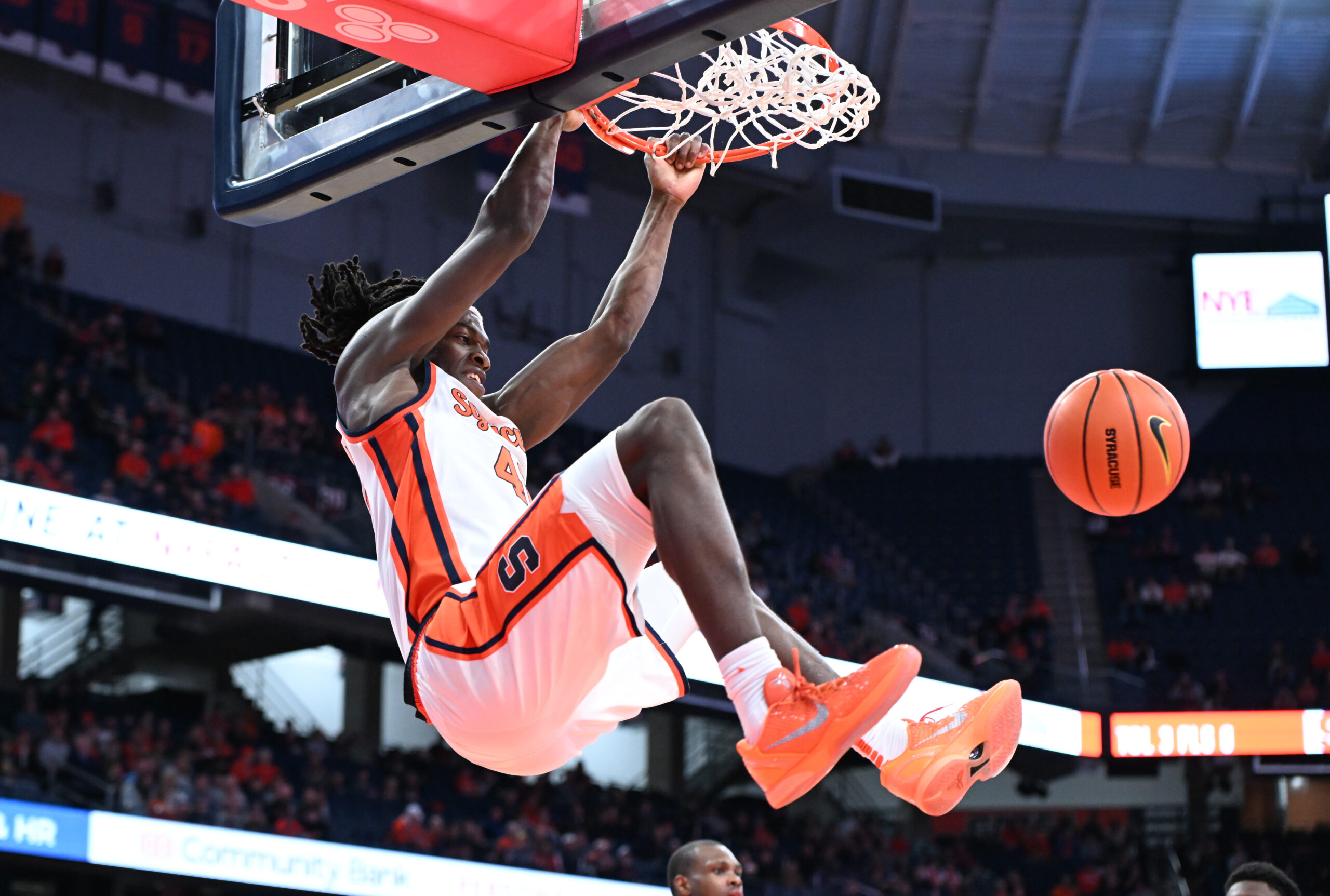 Nov 3, 2025; Syracuse, New York, USA; Syracuse Orange forward William Kyle III (42) dunks the ball in the second half against the Binghamton Bearcats at the JMA Wireless Dome. Mandatory Credit: Mark Konezny-Imagn Images
