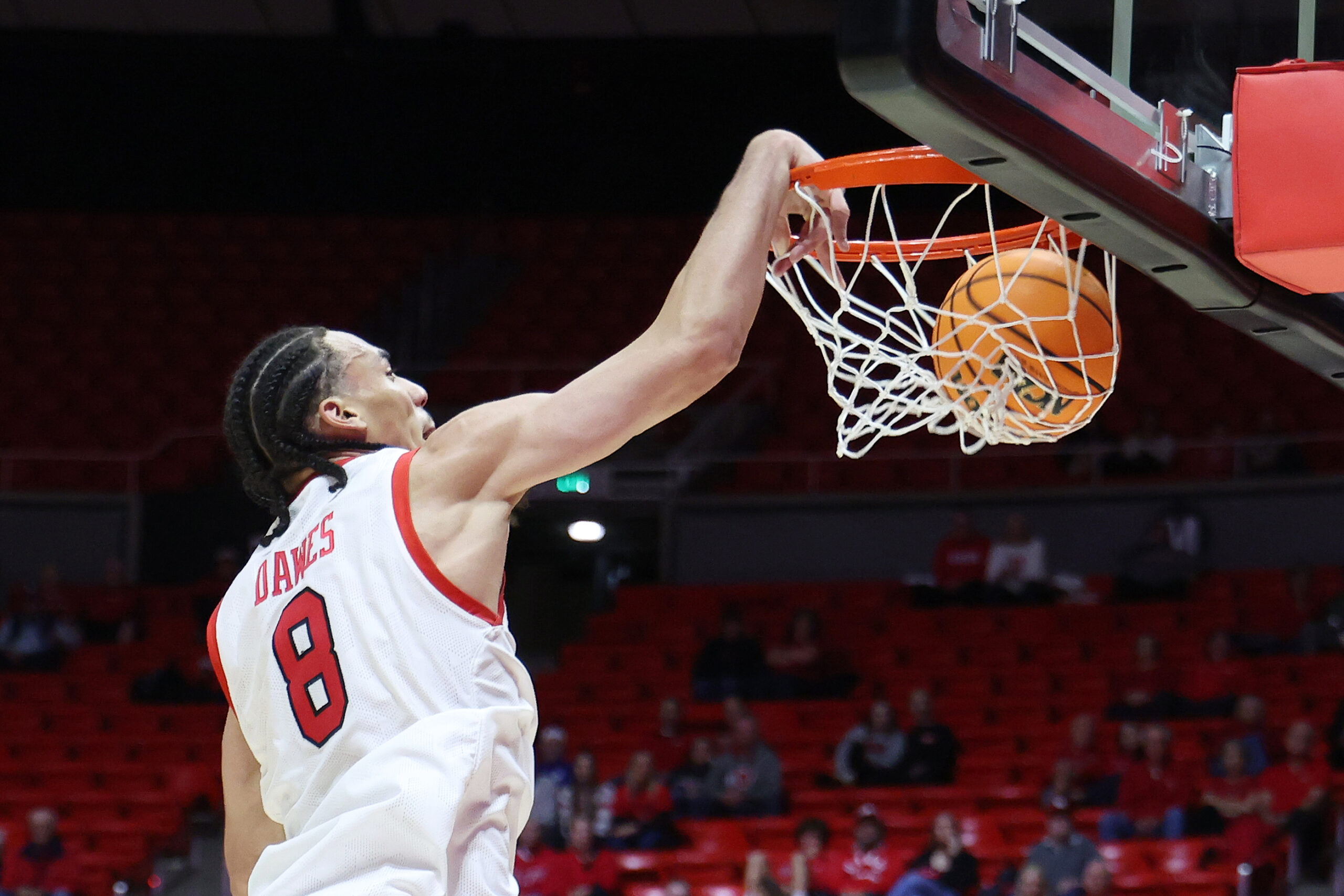 Nov 3, 2025; Salt Lake City, Utah, USA; Utah Utes forward Keanu Dawes (8) dunks against the San Jose State Spartans during the second half at Jon M. Huntsman Center. Mandatory Credit: Rob Gray-Imagn Images