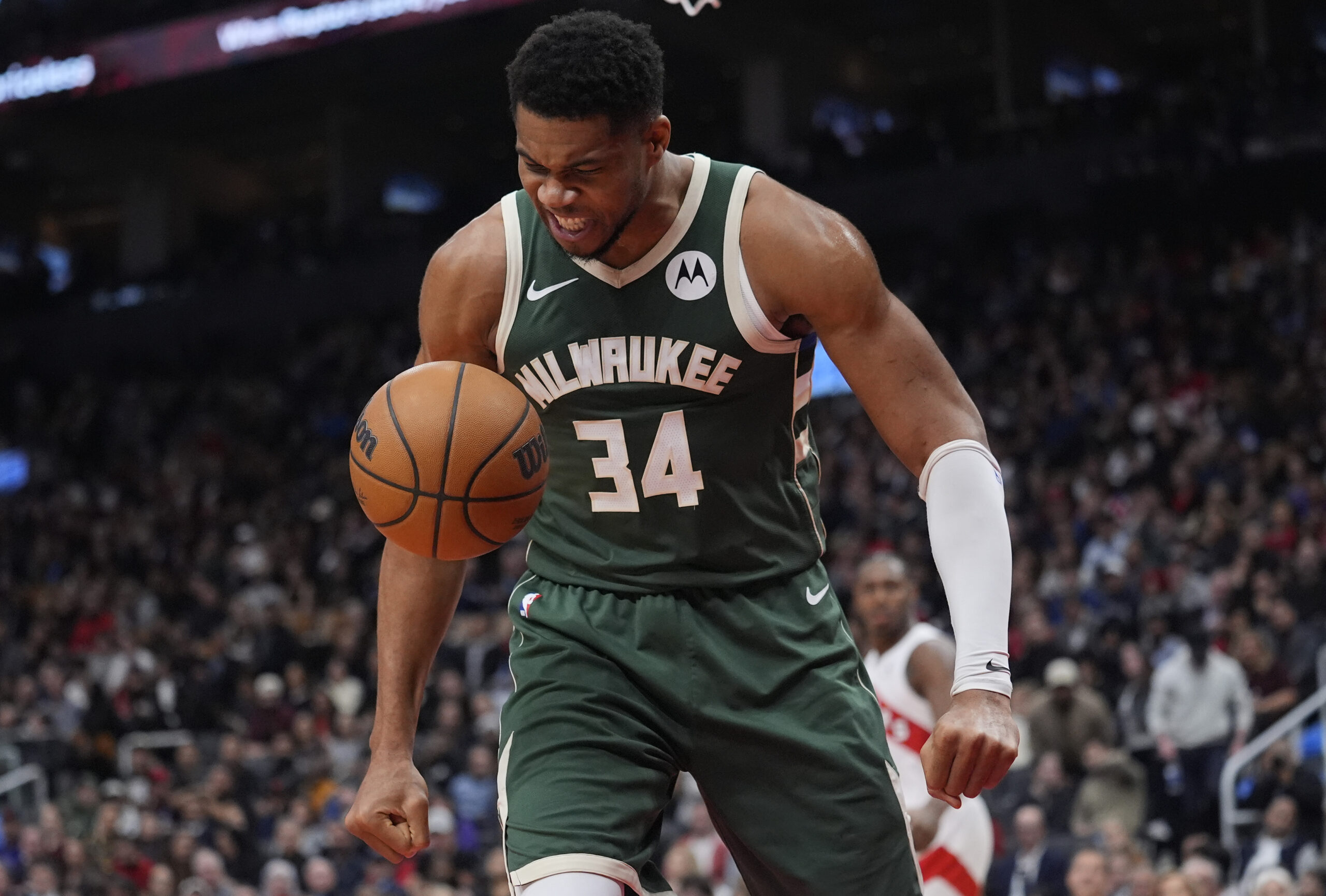 Nov 4, 2025; Toronto, Ontario, CAN; Milwaukee Bucks forward Giannis Antetokounmpo (34) reacts after making a basket against the Toronto Raptors during the first half at Scotiabank Arena. Mandatory Credit: John E. Sokolowski-Imagn Images