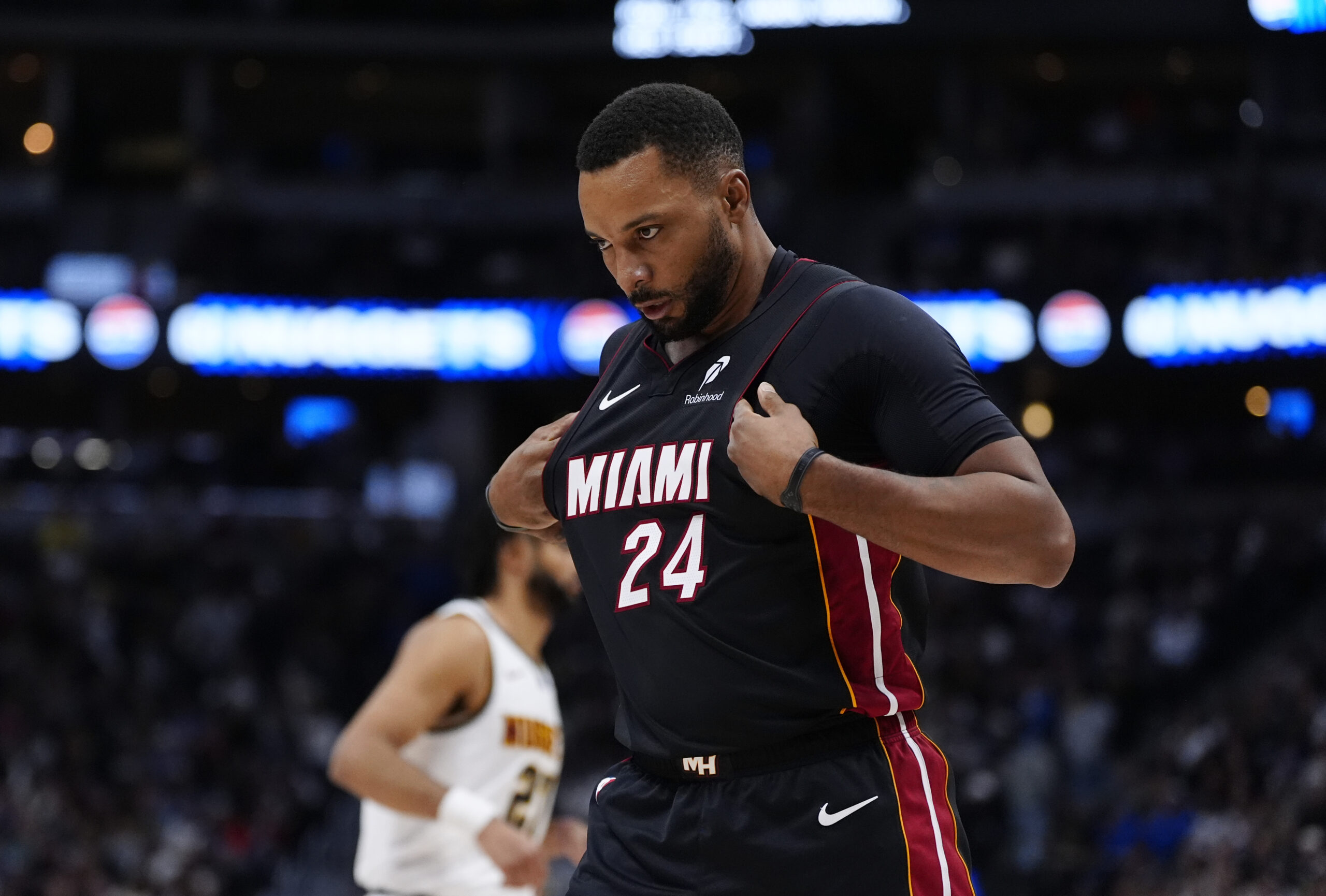 Nov 5, 2025; Denver, Colorado, USA; Miami Heat guard Norman Powell (24) reacts during the second half against the Denver Nuggets at Ball Arena. Mandatory Credit: Ron Chenoy-Imagn Images
