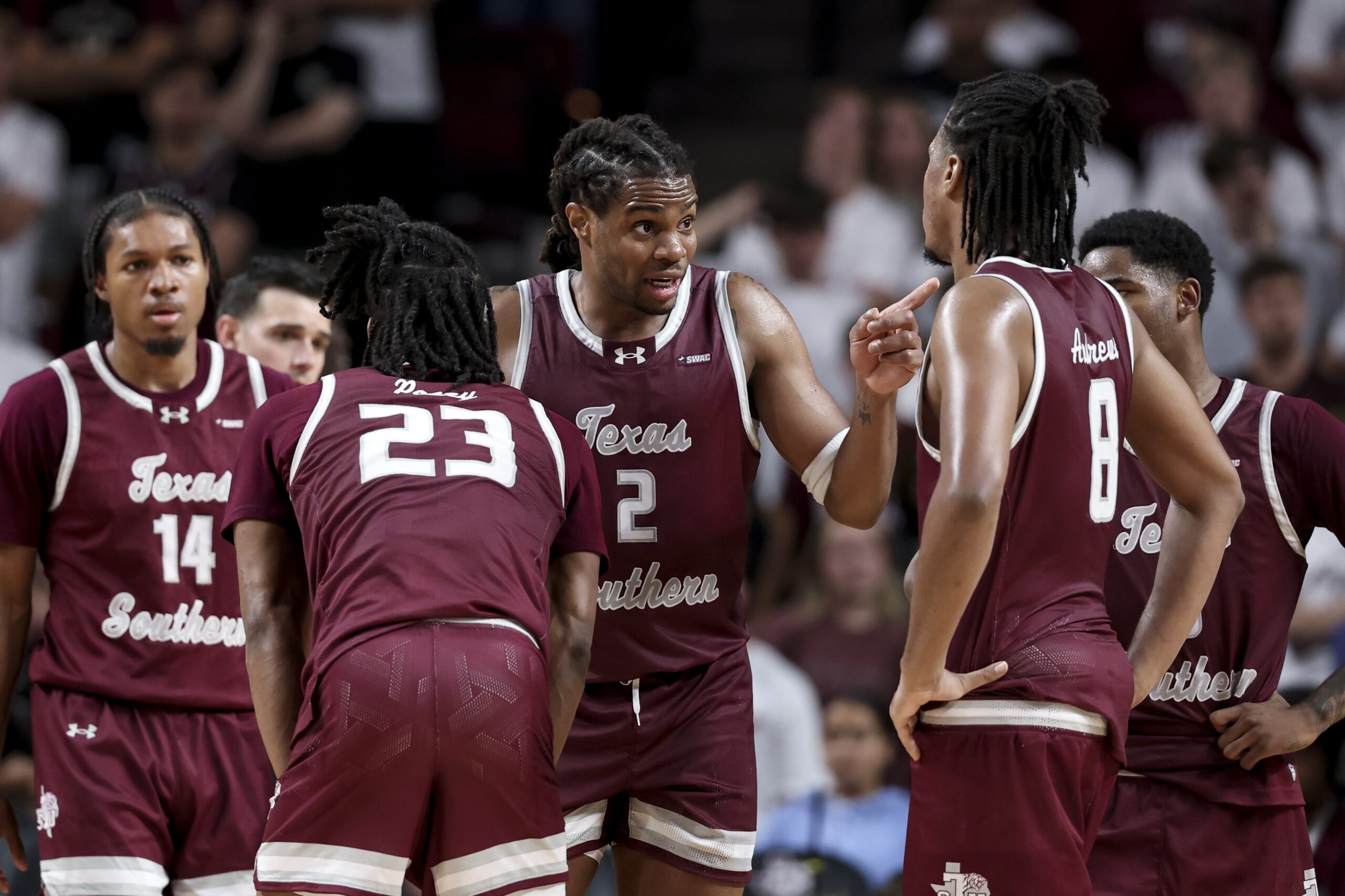 Nov 6, 2025; College Station, Texas, USA; Texas Southern Tigers forward Troy Hupstead (2) and teammates huddle up during a time-out in the during the second half against the Texas A&M Aggies at Reed Arena. Mandatory Credit: Maria Lysaker-Imagn Images