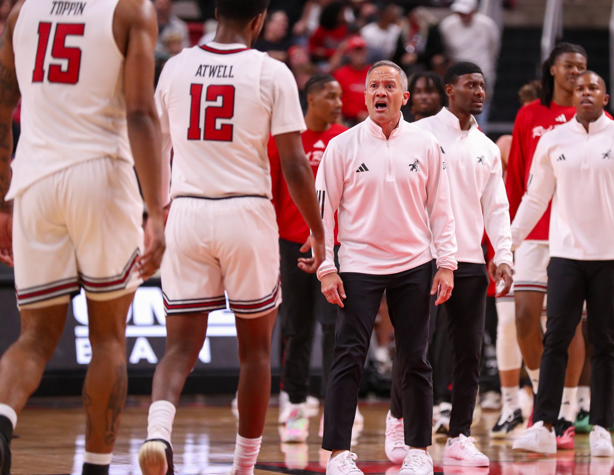 Texas Tech head coach Grant McCasland talks to his players during a timeout in a nonconference men's basketball game, Friday, Nov. 7, 2025, at United Supermarkets Arena.