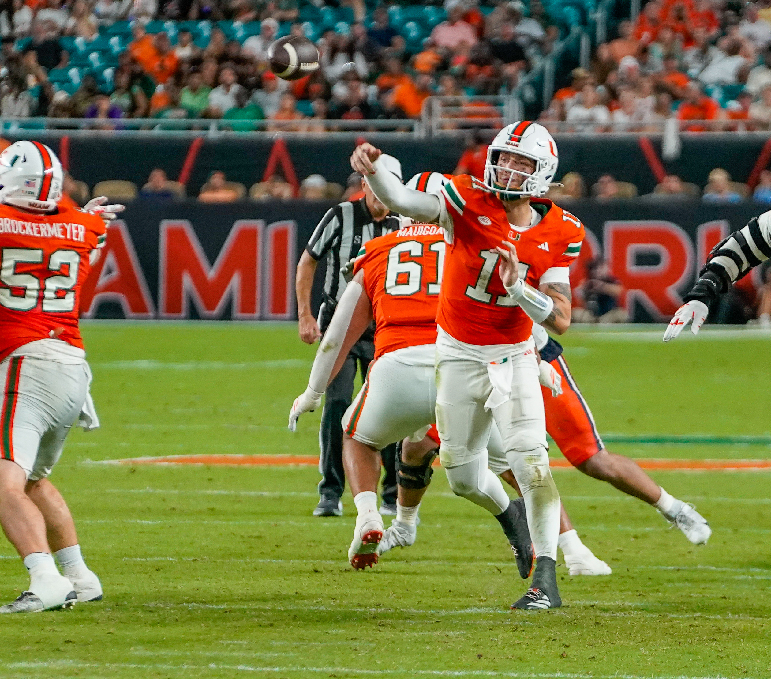 Nov 8, 2025; Miami Gardens, Florida, USA; Miami Hurricanes quarterback Carson Beck (11) throws a pass against the Syracuse Orange during the third quarter at Hard Rock Stadium. Mandatory Credit: Jeff Romance-Imagn Images