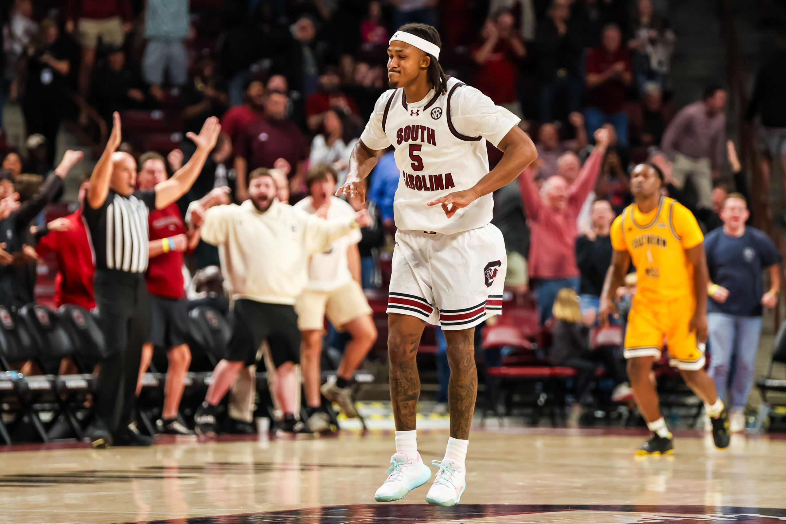 Nov 9, 2025; Columbia, South Carolina, USA; South Carolina Gamecocks guard Meechie Johnson (5) celebrates a three point basket against the Southern Mississippi Golden Eagles in the second half at Colonial Life Arena. Mandatory Credit: Jeff Blake-Imagn Images