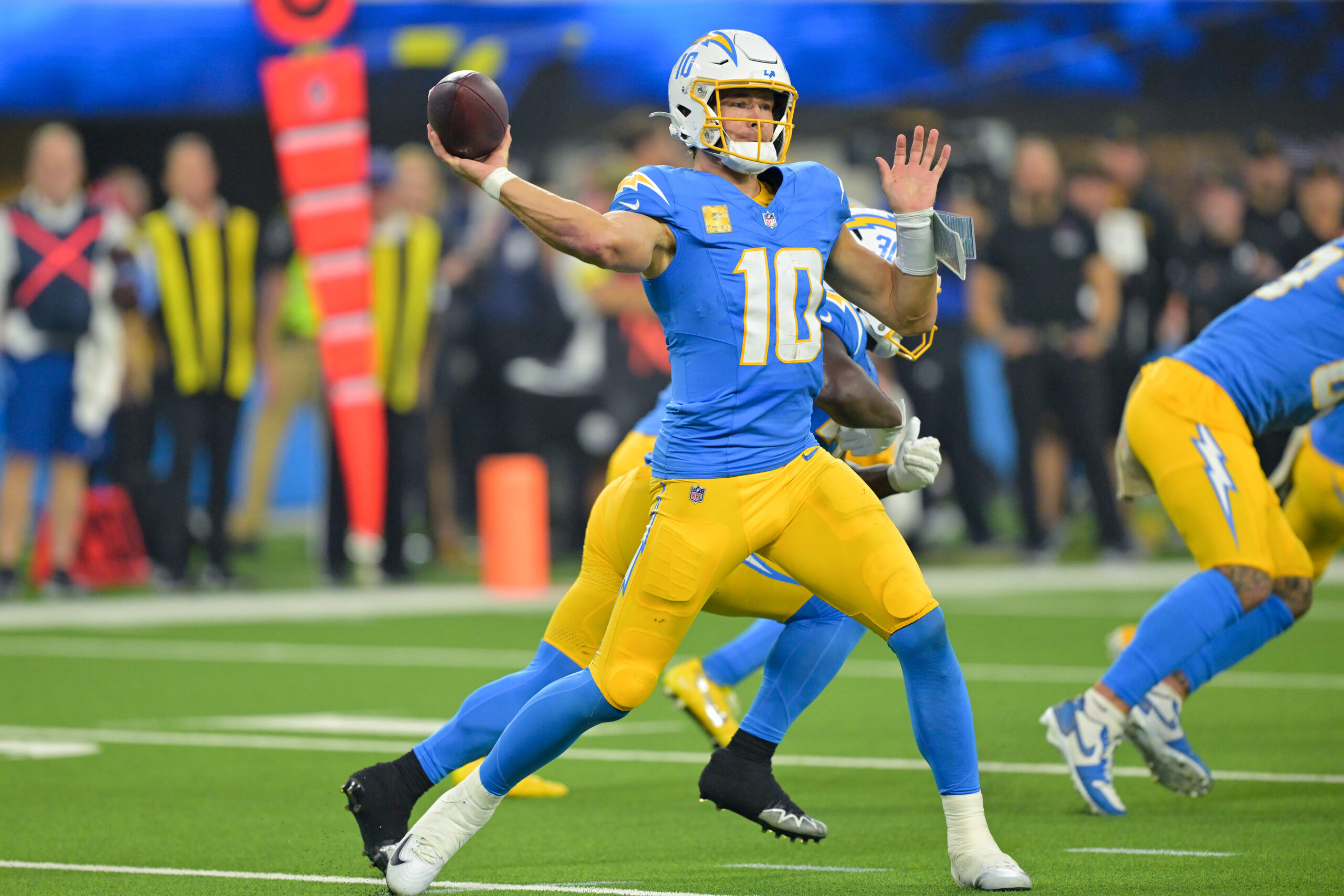 Nov 9, 2025; Inglewood, California, USA; Los Angeles Chargers quarterback Justin Herbert (10) passes the ball against the Pittsburgh Steelers during the fourth quarter of the game at SoFi Stadium. Mandatory Credit: Jayne Kamin-Oncea-Imagn Images
