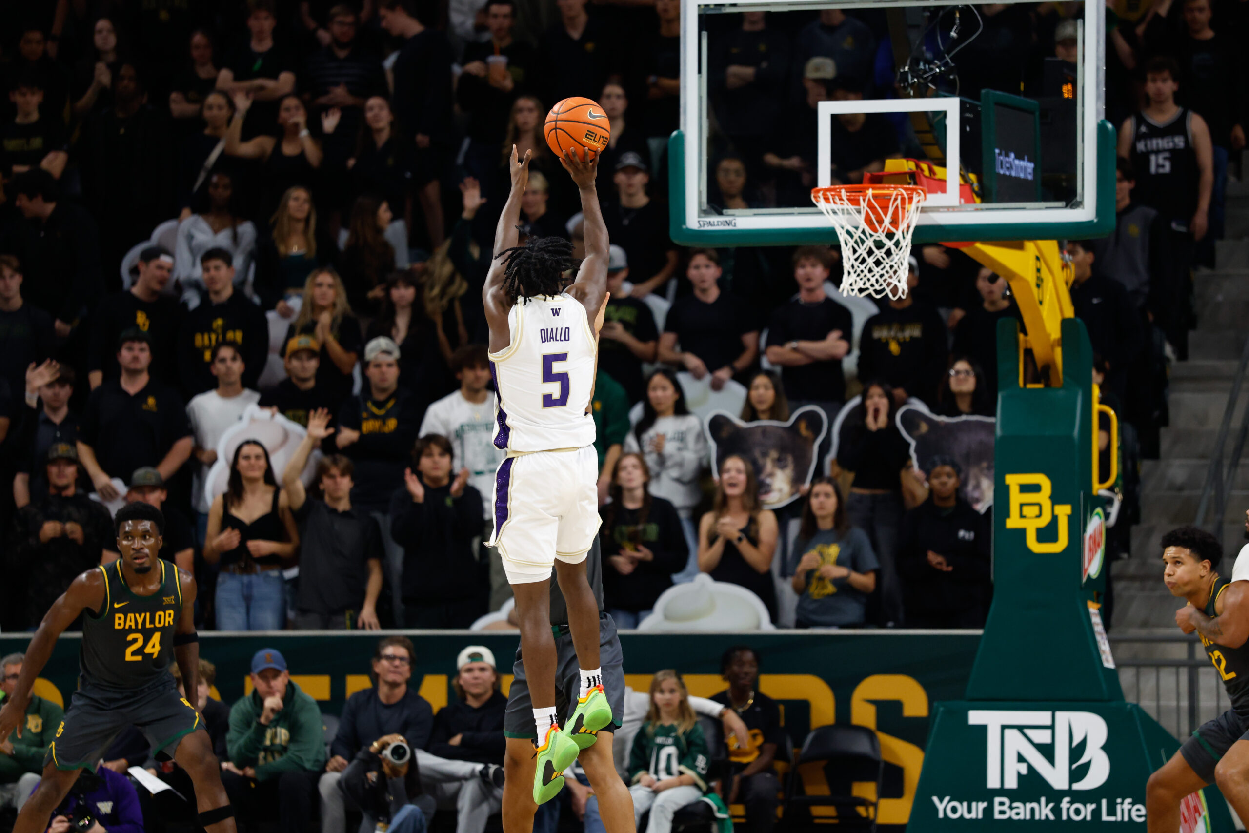 Nov 9, 2025; Waco, Texas, USA; Washington Huskies guard Zoom Diallo (5) scores a basket against the Baylor Bears  during the second half at Paul and Alejandra Foster Pavilion. Mandatory Credit: Chris Jones-Imagn Images