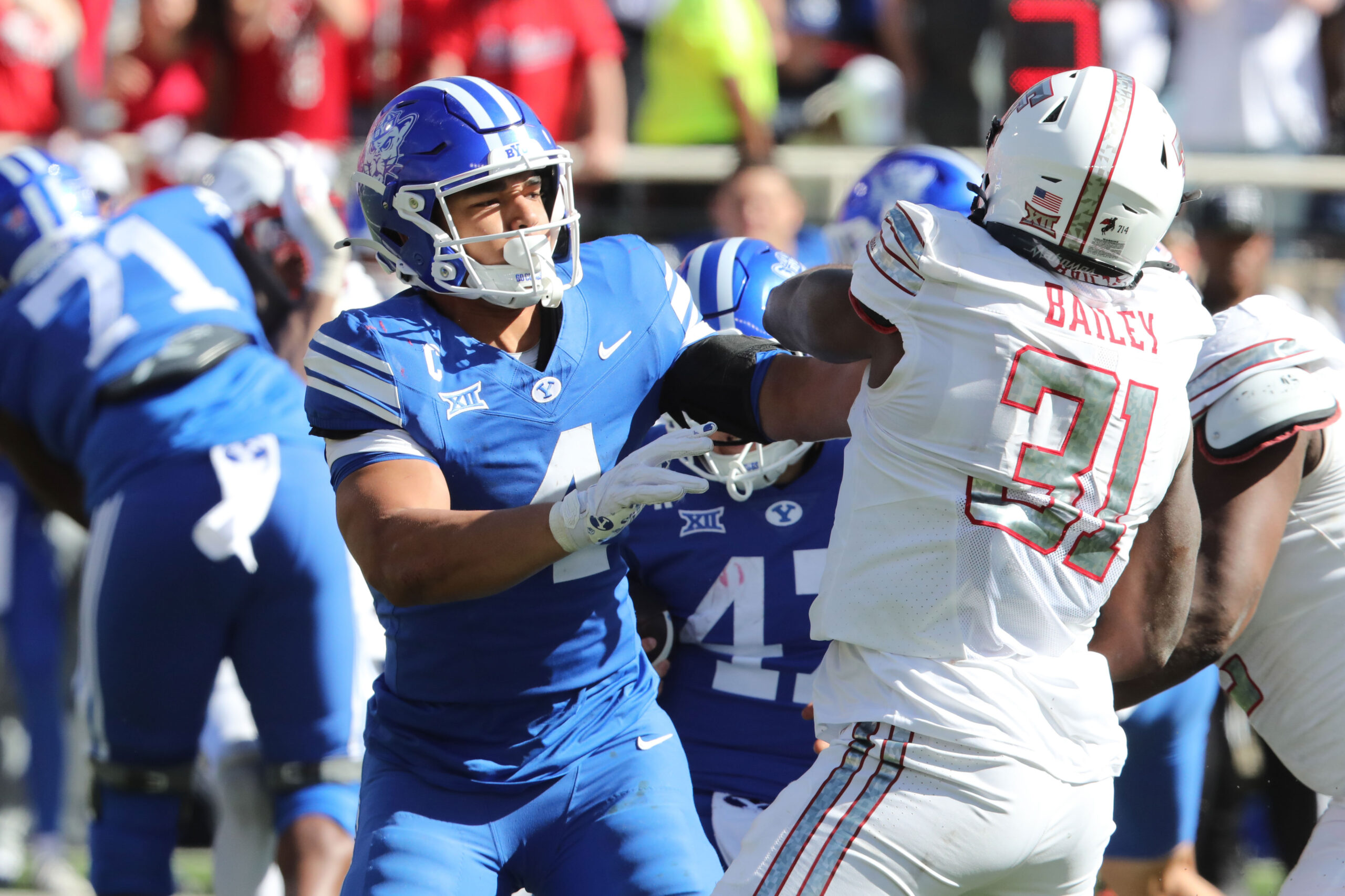 Nov 8, 2025; Lubbock, Texas, USA;  Texas Tech Red Raiders defensive lineman David Bailey (31) rushes against  Brigham Young Cougars running back LJ Martin (4) in the second half at Jones AT&T Stadium. Mandatory Credit: Michael C. Johnson-Imagn Images