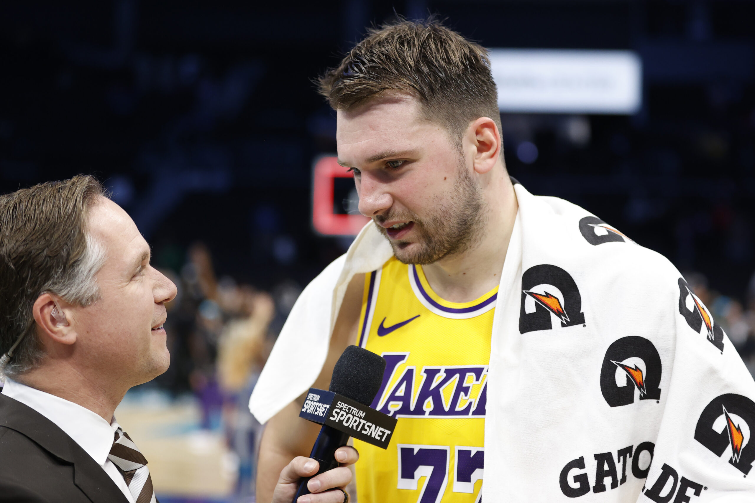 Nov 10, 2025; Charlotte, North Carolina, USA; Los Angeles Lakers forward/guard Luka Doncic (77) is interviewed following the game against the Charlotte Hornets at Spectrum Center. Mandatory Credit: Brian Westerholt-Imagn Images