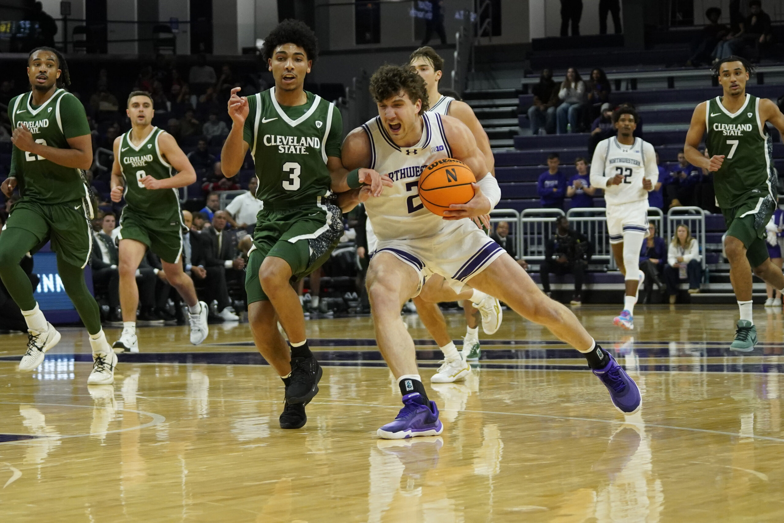 Nov 10, 2025; Evanston, Illinois, USA; Cleveland State Vikings guard Tre Beard (3) defends Northwestern Wildcats forward Nick Martinelli (2) during the second half at Welsh-Ryan Arena. Mandatory Credit: David Banks-Imagn Images