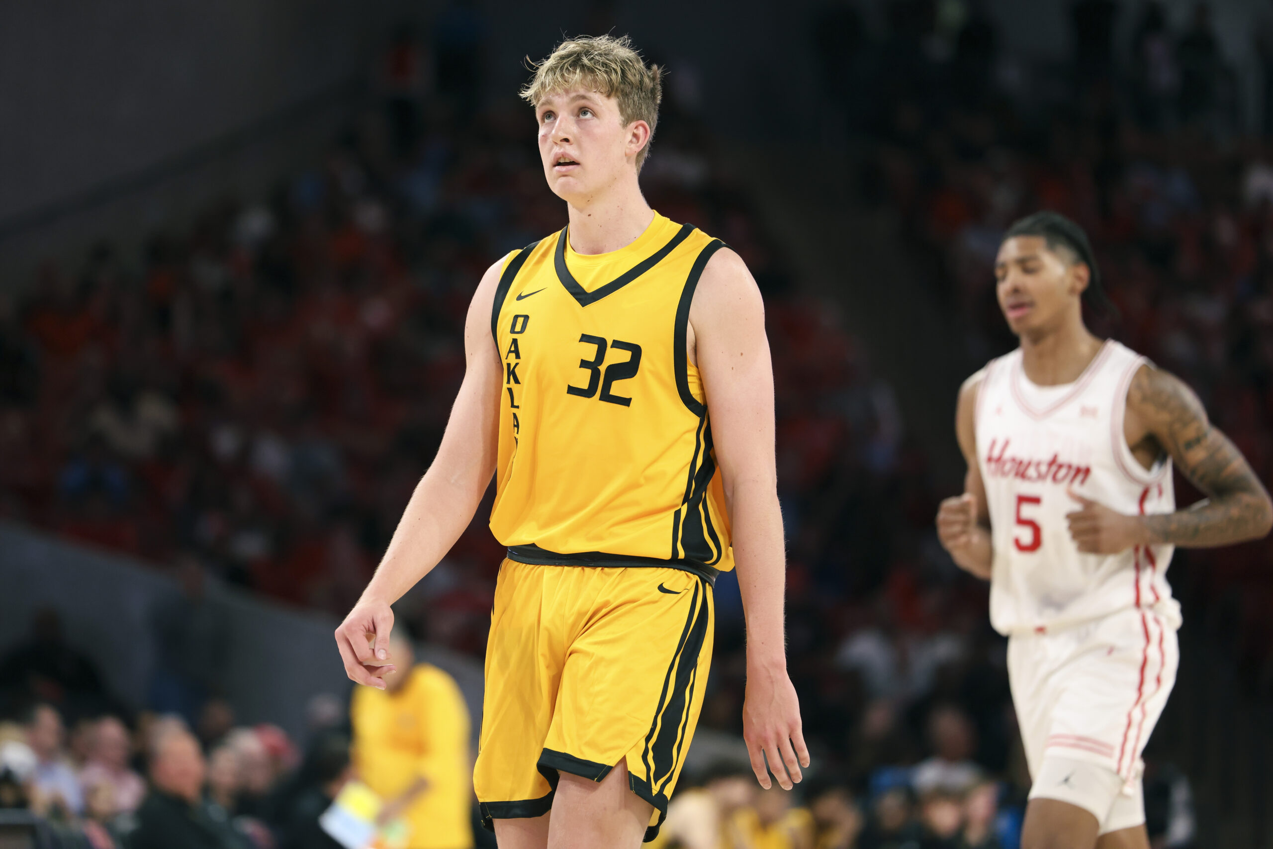 Nov 12, 2025; Houston, Texas, USA; Oakland Golden Grizzlies forward Isaac Garrett (32) reacts after a play during the second half against the Houston Cougars at Fertitta Center. Mandatory Credit: Troy Taormina-Imagn Images