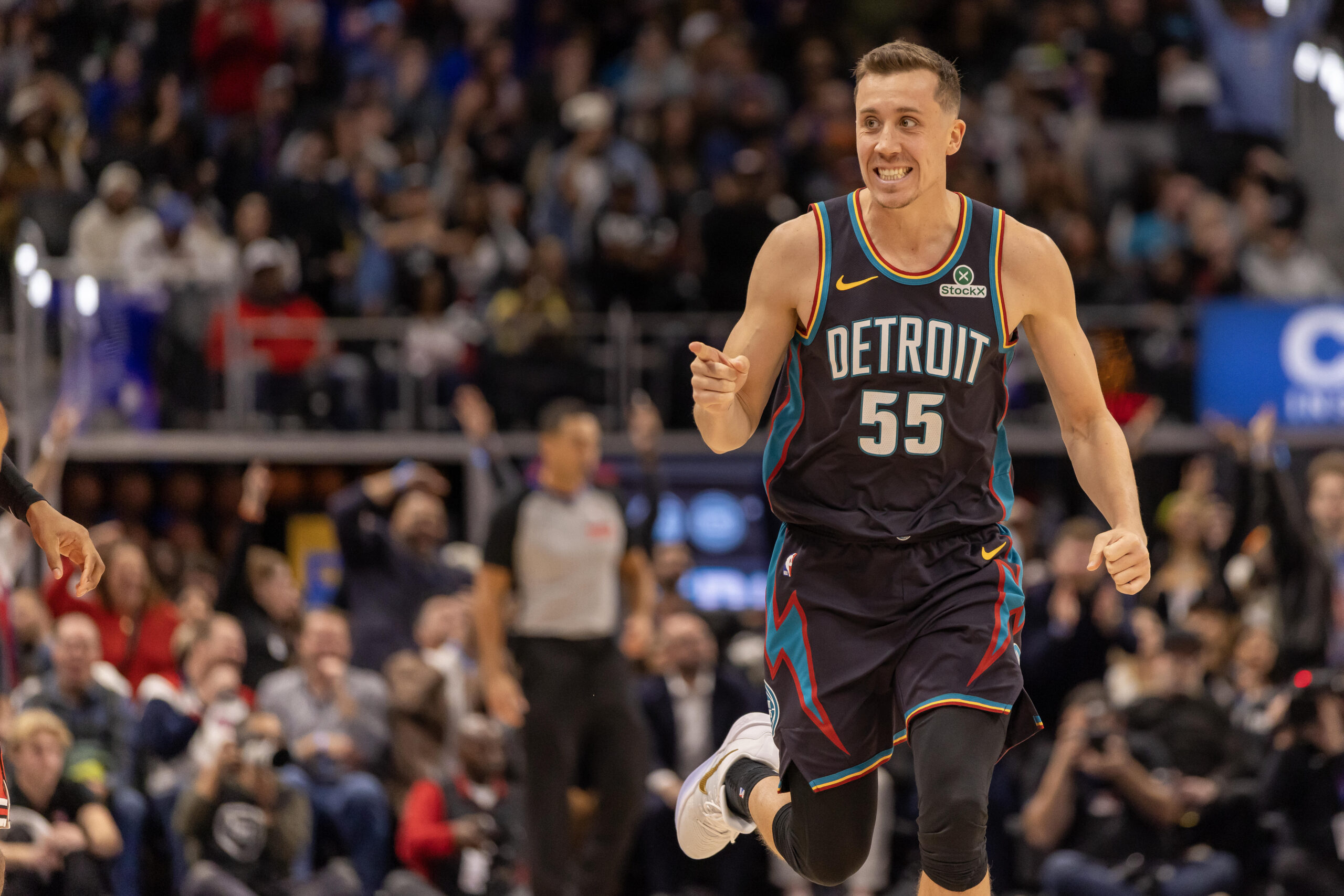 Nov 12, 2025; Detroit, Michigan, USA; Detroit Pistons forward Duncan Robinson (55) runs up court after shooting a three point basket against the Chicago Bulls during the second half at Little Caesars Arena. Mandatory Credit: David Reginek-Imagn Images