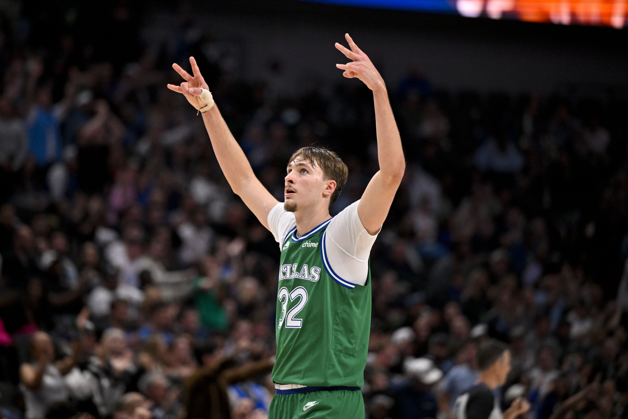 Nov 12, 2025; Dallas, Texas, USA; Dallas Mavericks forward Cooper Flagg (32) celebrates a three point basket by guard Max Christie (not pictured) against the Phoenix Suns during the second half at the American Airlines Center. Mandatory Credit: Jerome Miron-Imagn Images