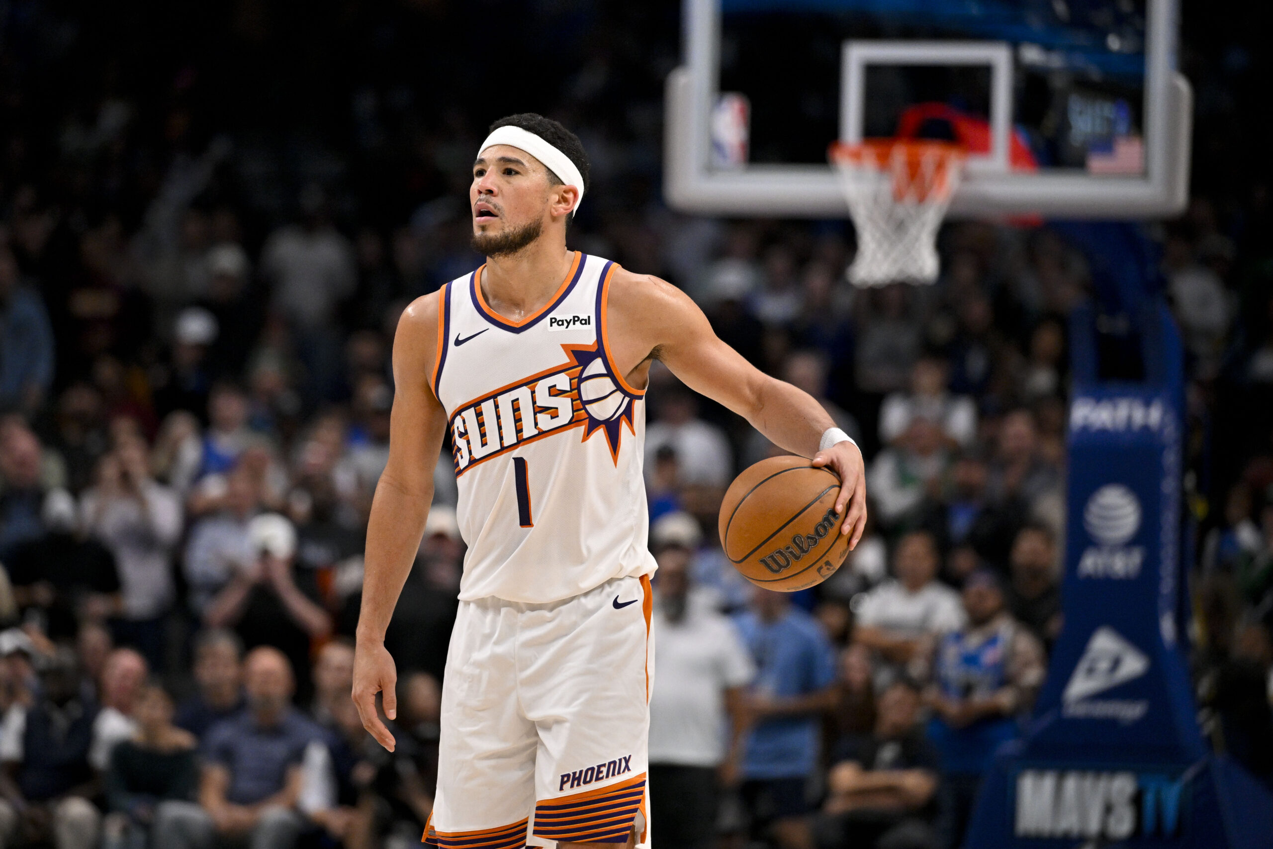 Nov 12, 2025; Dallas, Texas, USA; Phoenix Suns guard Devin Booker (1) brings the ball up court against the Dallas Mavericks during the second half at the American Airlines Center. Mandatory Credit: Jerome Miron-Imagn Images