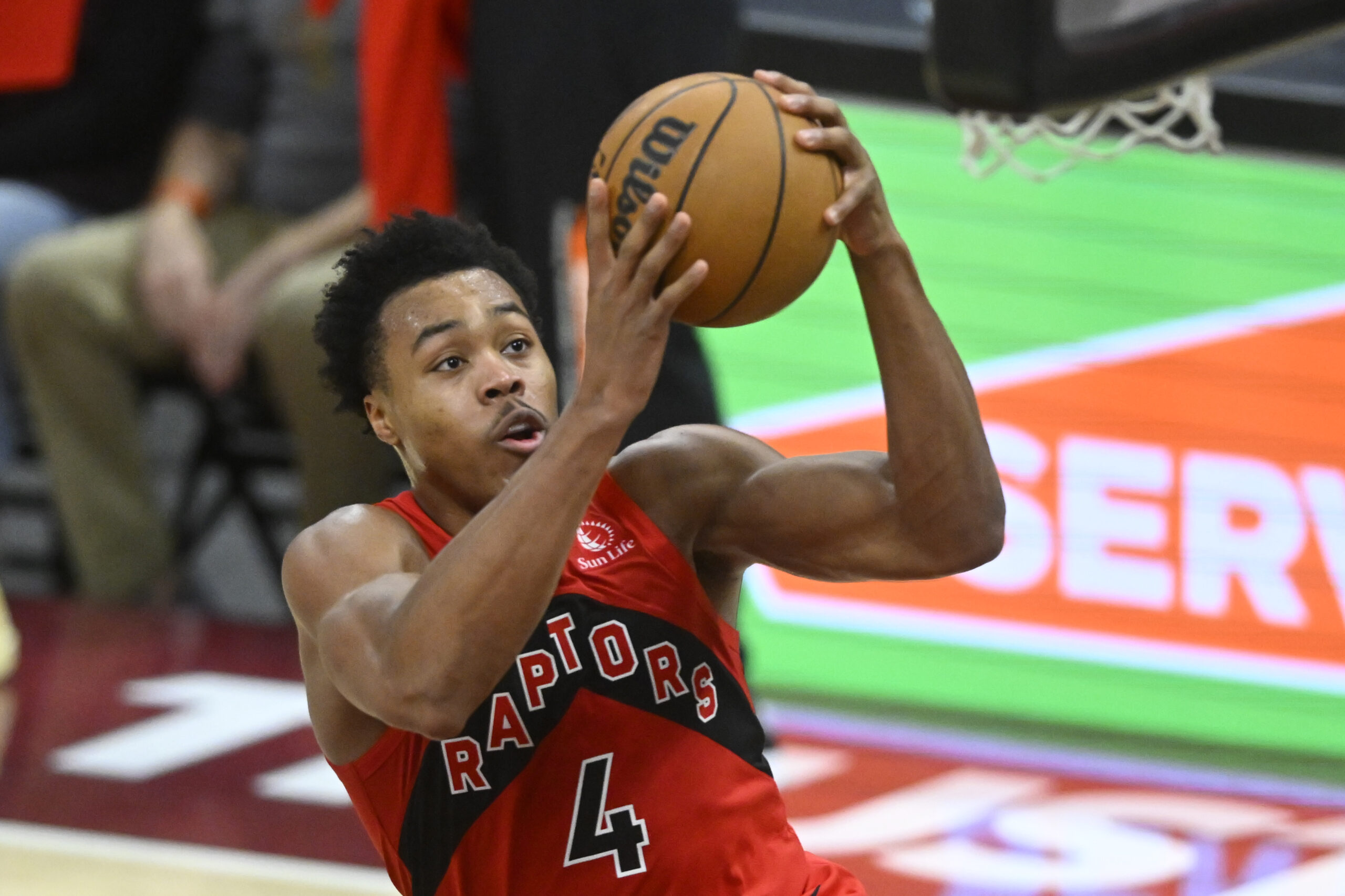 Nov 13, 2025; Cleveland, Ohio, USA; Toronto Raptors forward Scottie Barnes (4) drives to the basket in the fourth quarter against the Cleveland Cavaliers at Rocket Arena. Mandatory Credit: David Richard-Imagn Images