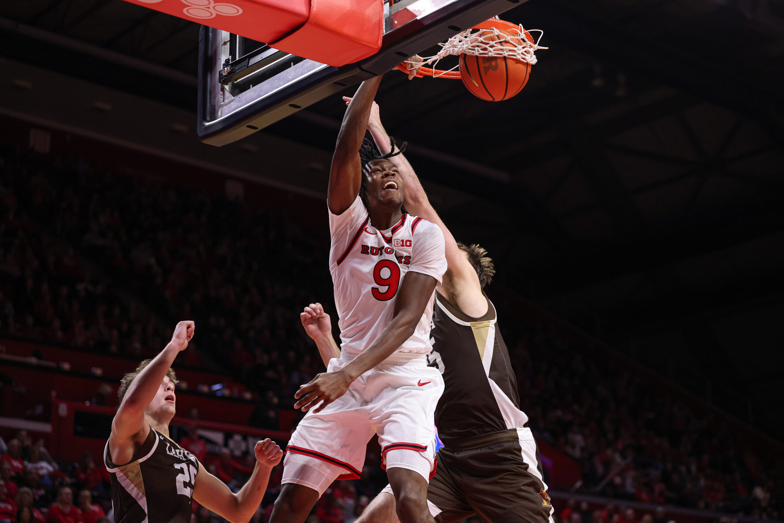 Nov 14, 2025; Piscataway, New Jersey, USA; Rutgers Scarlet Knights forward Dylan Grant (9) dunks the ball during the second half against the Lehigh Mountain Hawks at Jersey Mike's Arena. Mandatory Credit: Vincent Carchietta-Imagn Images
