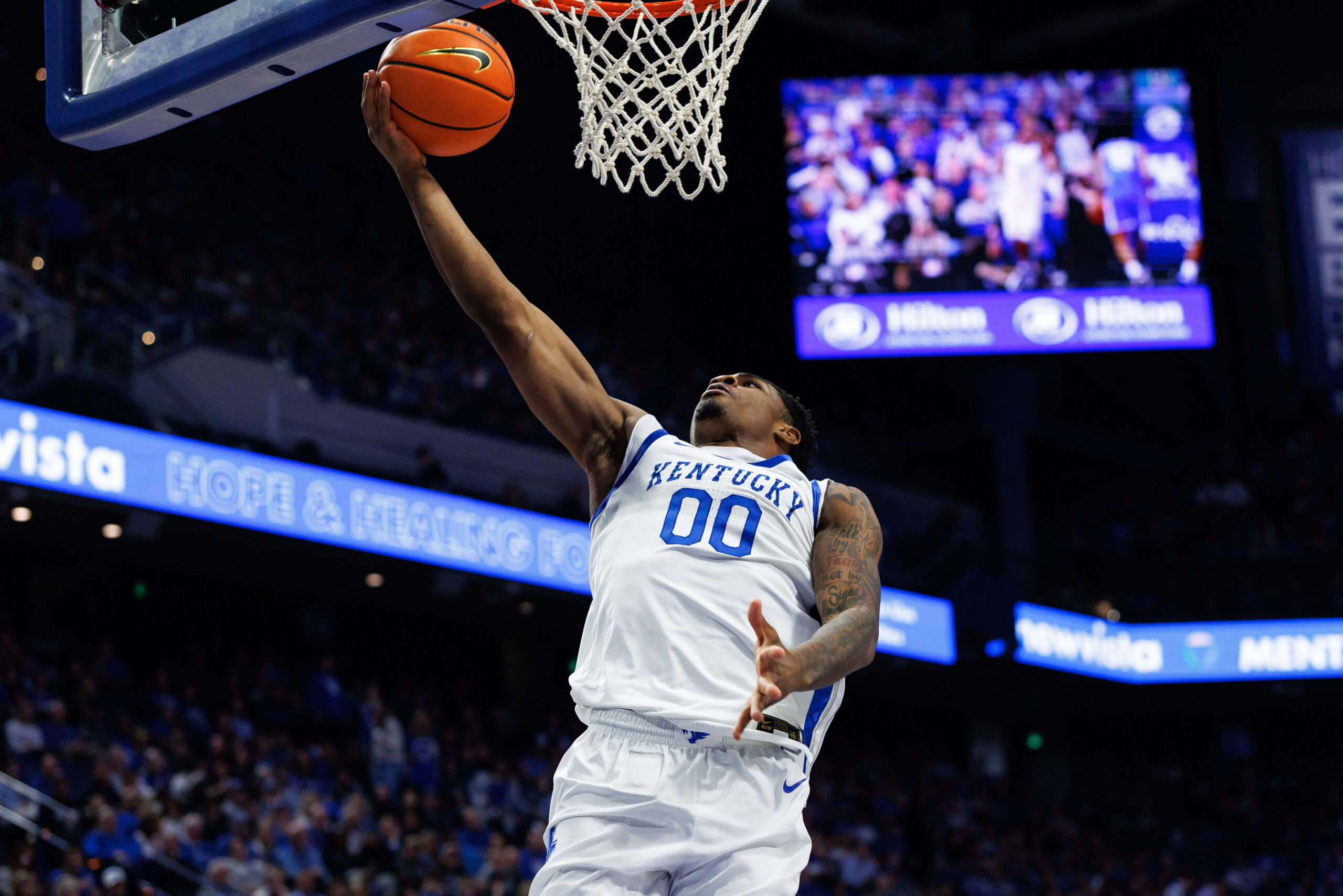 Nov 14, 2025; Lexington, Kentucky, USA; Kentucky Wildcats guard Otega Oweh (00) goes to the basket during the second half against the Eastern Illinois Panthers at Rupp Arena at Central Bank Center. Mandatory Credit: Jordan Prather-Imagn Images
