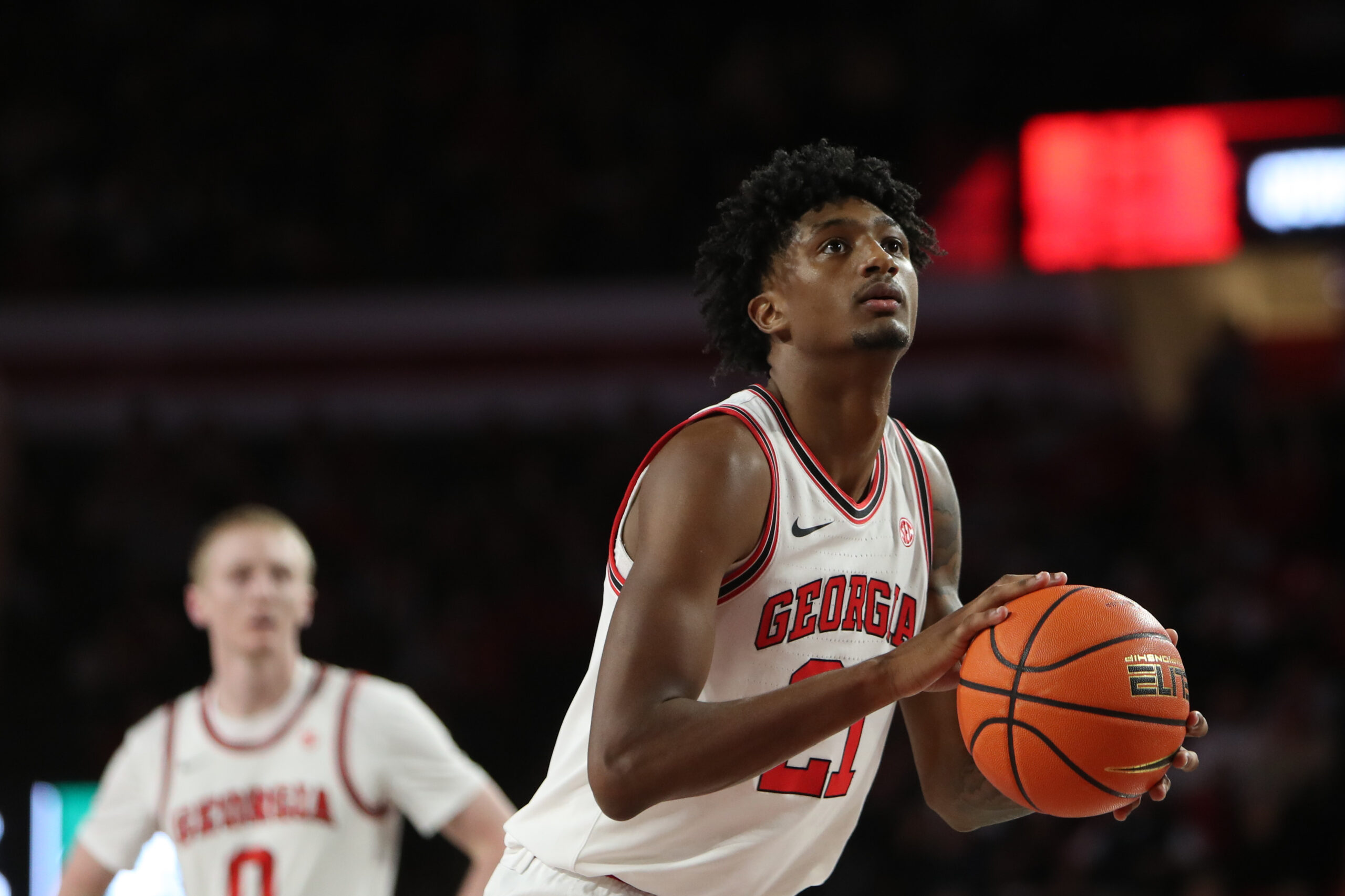 Nov 14, 2025; Athens, Georgia, USA; Georgia Bulldogs forward Jake Wilkins (21) shoots a free throw against the Georgia Tech Yellow Jackets during the first half at Stegeman Coliseum. Mandatory Credit: Mady Mertens-Imagn Images