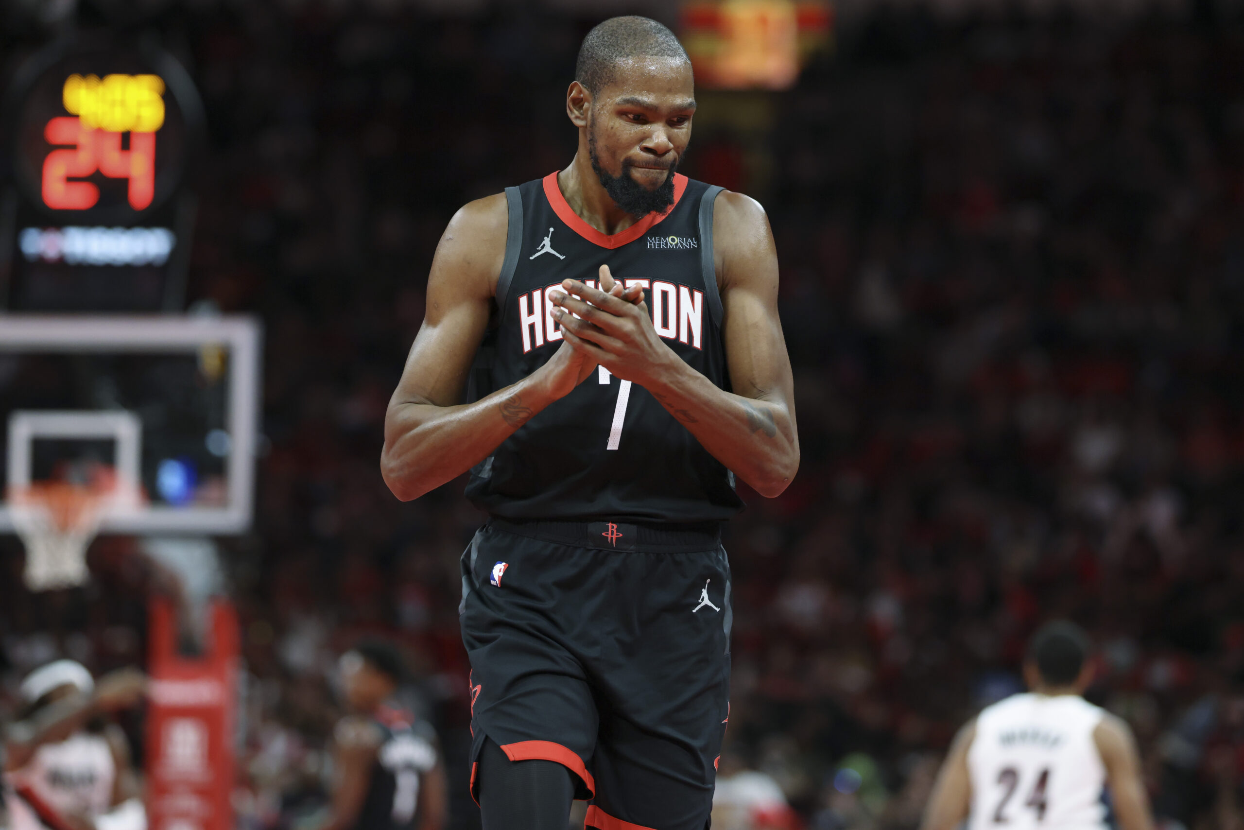 Nov 14, 2025; Houston, Texas, USA; Houston Rockets forward Kevin Durant (7) claps after scoring during the third quarter against the Portland Trail Blazers at Toyota Center. Mandatory Credit: Troy Taormina-Imagn Images
