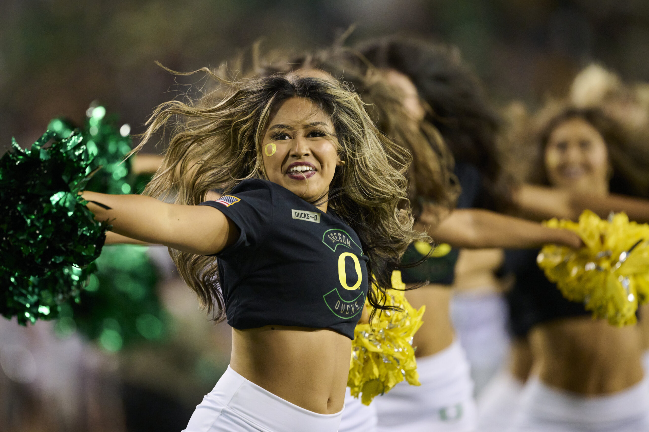 Nov 14, 2025; Eugene, Oregon, USA; The Oregon Ducks cheerleaders perform during the second half in a game between the Oregon Ducks and the Minnesota Golden Gophers at Autzen Stadium. Mandatory Credit: Troy Wayrynen-Imagn Images