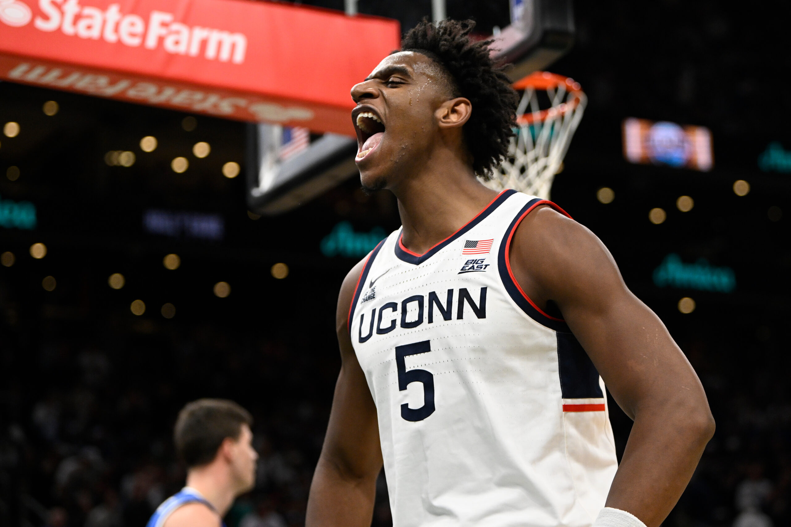 Nov 15, 2025; Boston, Massachusetts, USA; UConn Huskies forward Tarris Reed Jr. (5) reacts to a foul during the first half by the BYU Cougars at TD Garden. Mandatory Credit: Eric Canha-Imagn Images