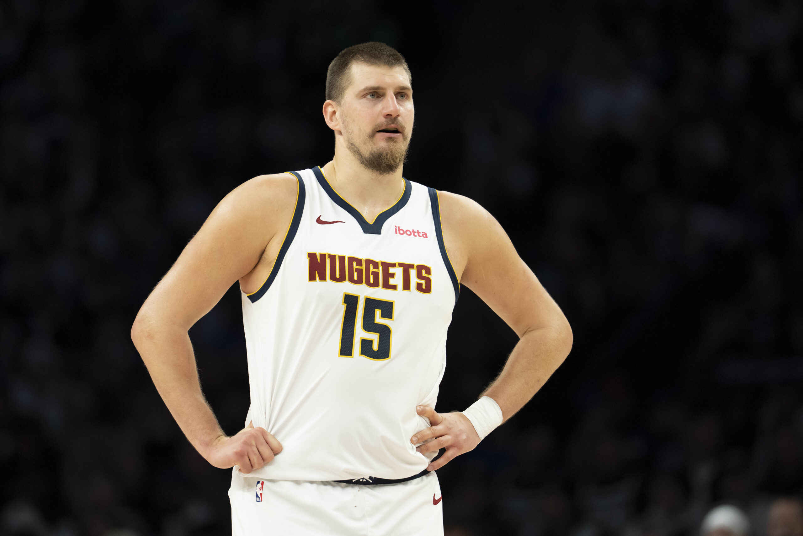Nov 15, 2025; Minneapolis, Minnesota, USA; Denver Nuggets center Nikola Jokic (15) looks on against the Minnesota Timberwolves in the second half at Target Center. Mandatory Credit: Jesse Johnson-Imagn Images