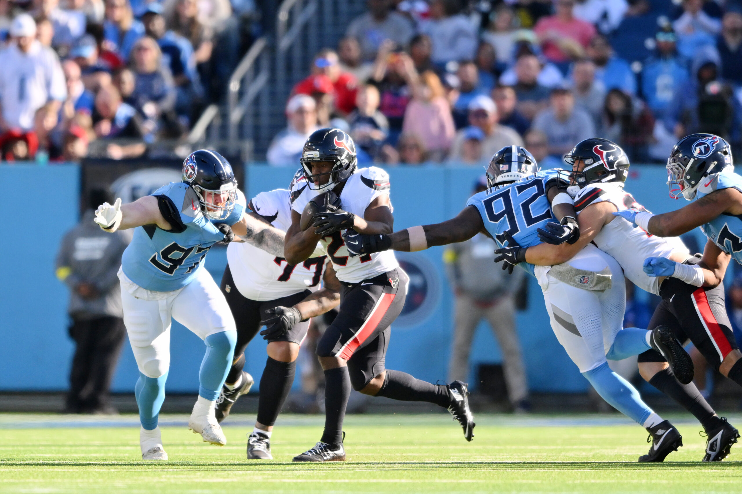 Nov 16, 2025; Nashville, Tennessee, USA; Houston Texans running back Nick Chubb (21) runs with the ball against the Tennessee Titans during the second half at Nissan Stadium. Mandatory Credit: Steve Roberts-Imagn Images