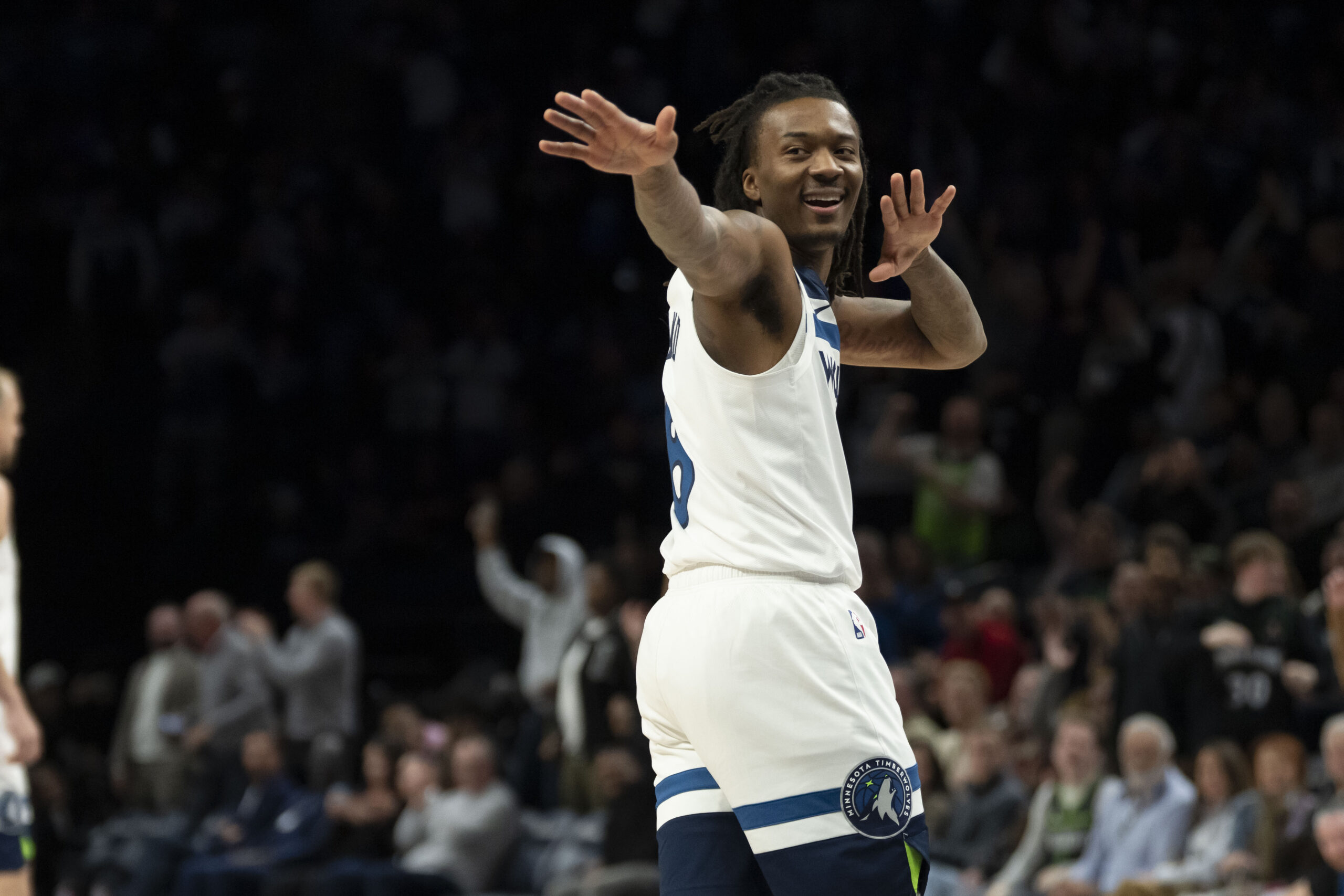 Nov 17, 2025; Minneapolis, Minnesota, USA; Minnesota Timberwolves guard Bones Hyland (8) celebrates after making a shot against the Dallas Mavericks in the second half at Target Center. Mandatory Credit: Jesse Johnson-Imagn Images